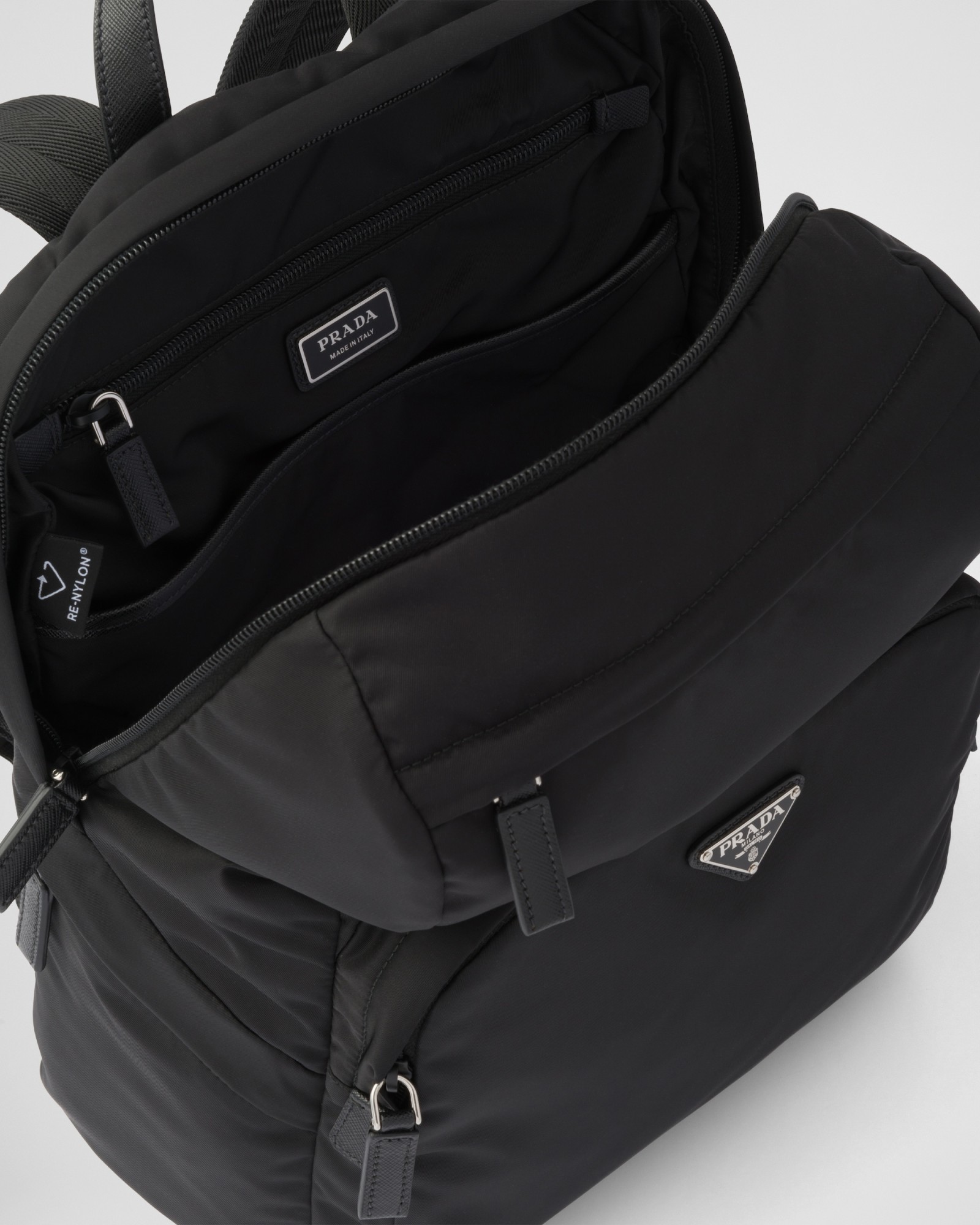 Prada Structured Leather Backpack With Logo Zipper Closure In Black