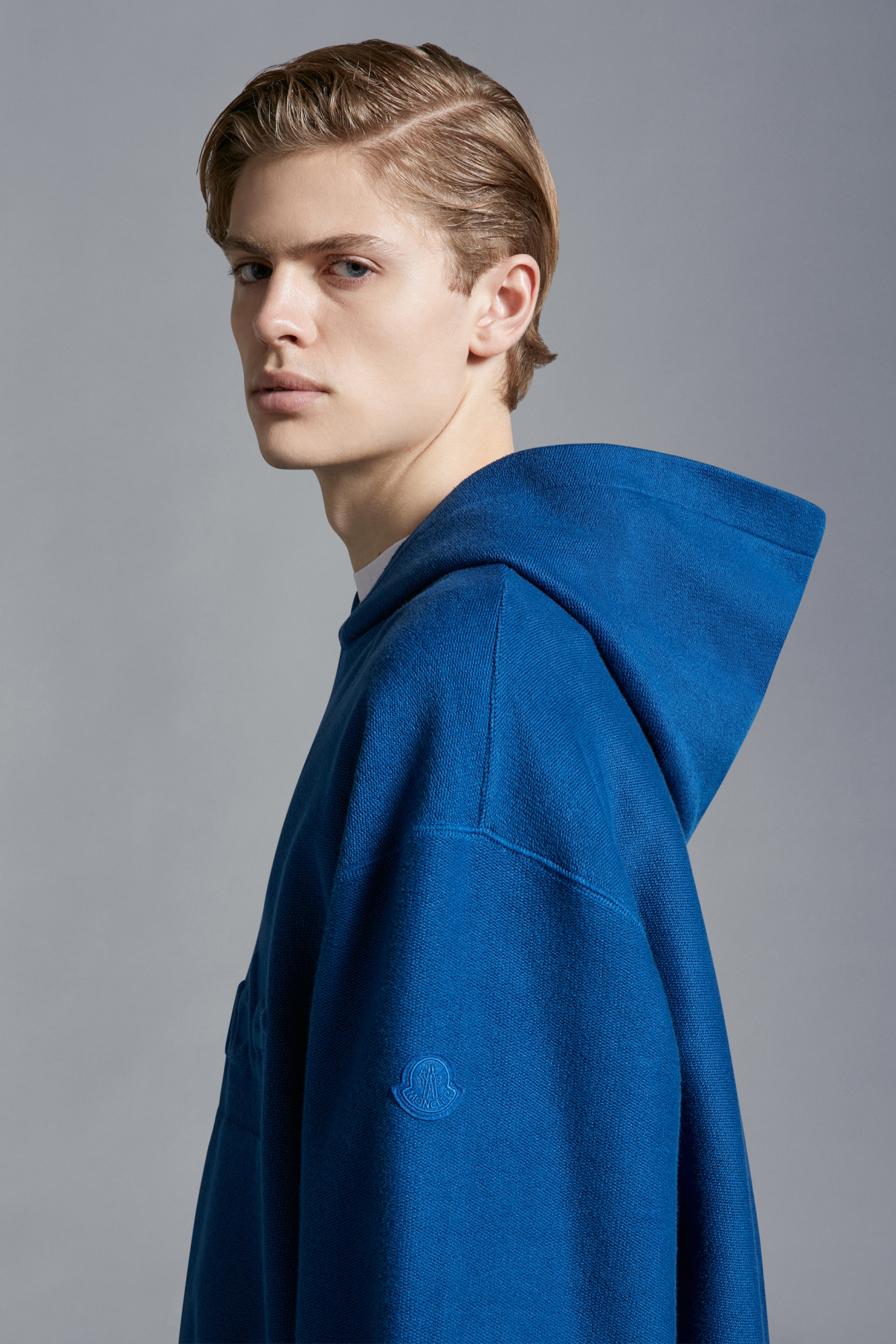 Moncler Logo Embossed Hoodie In Blue