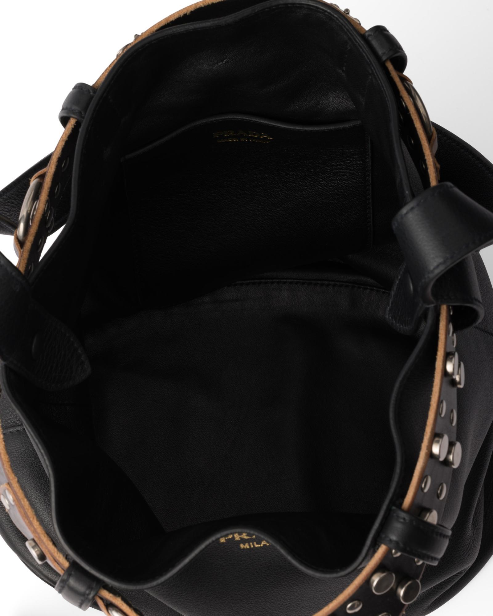 Prada Studded Belt Leather Bucket Bag In Black