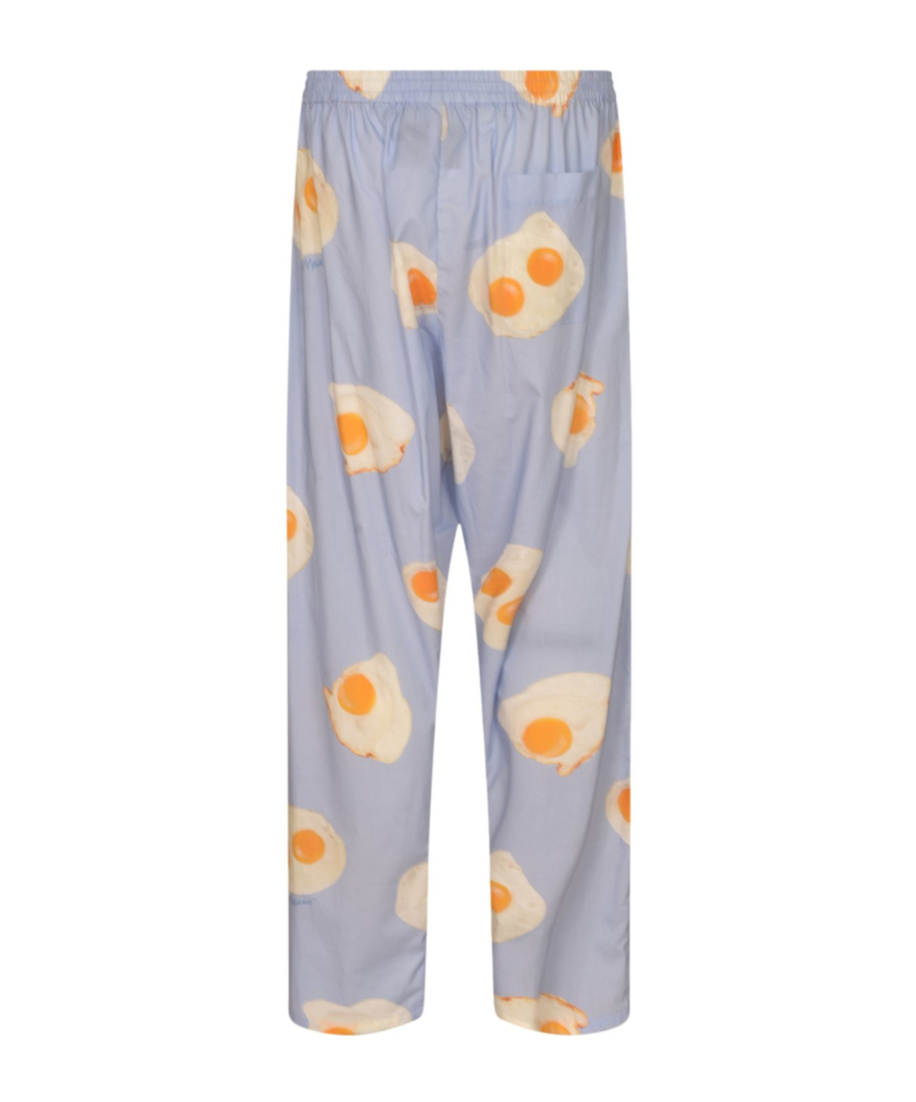 Moschino All-over Printed Trousers In Blue