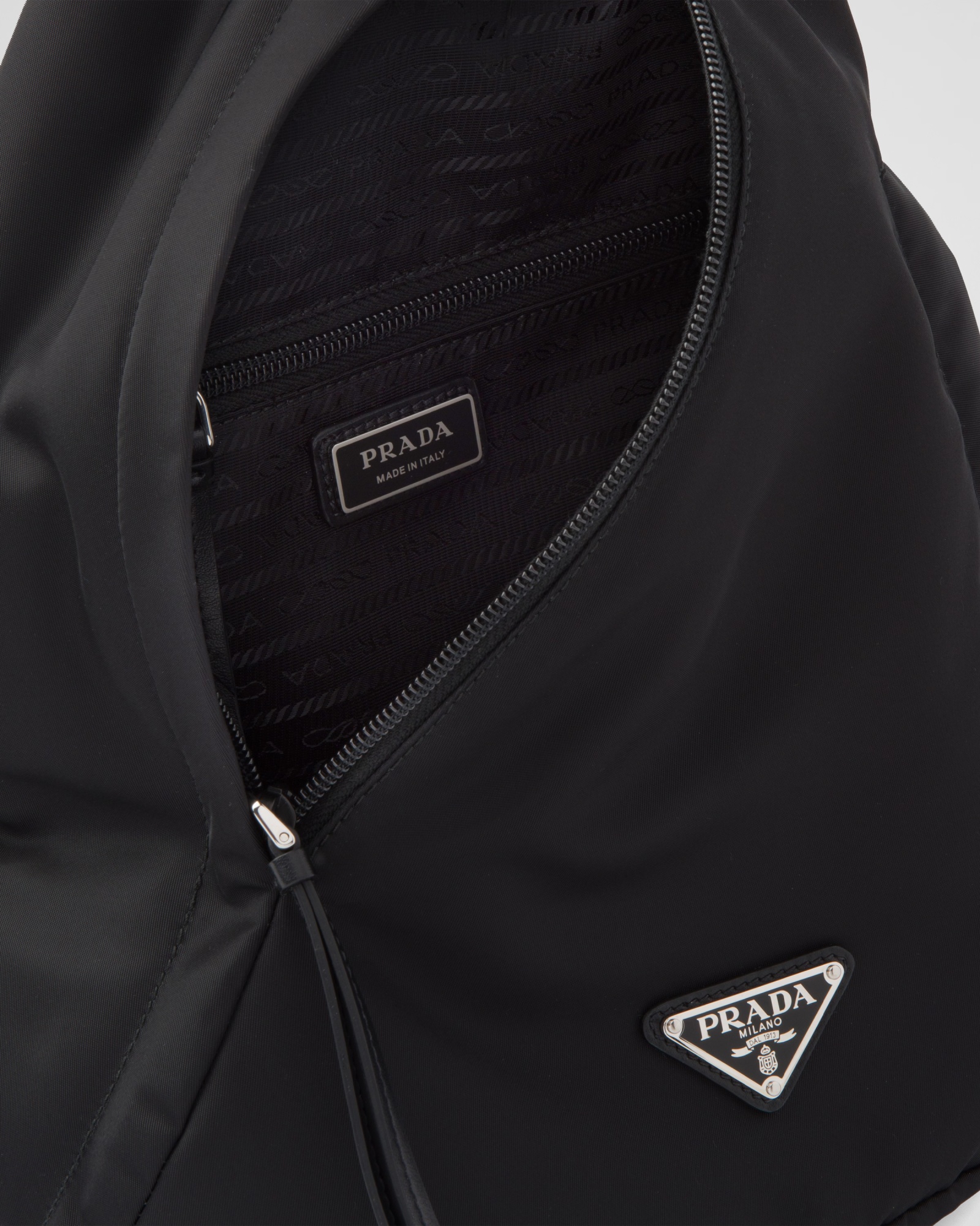 Prada Re-nylon Logo-plaque Backpack In Black