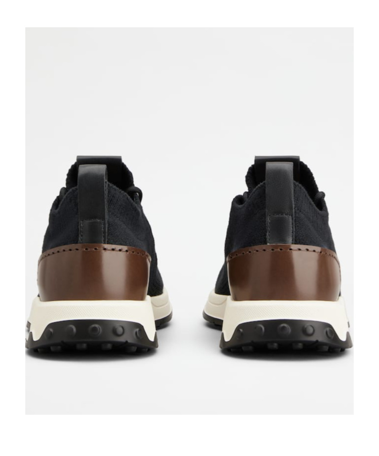 Tod's Laced Sneakers In Black