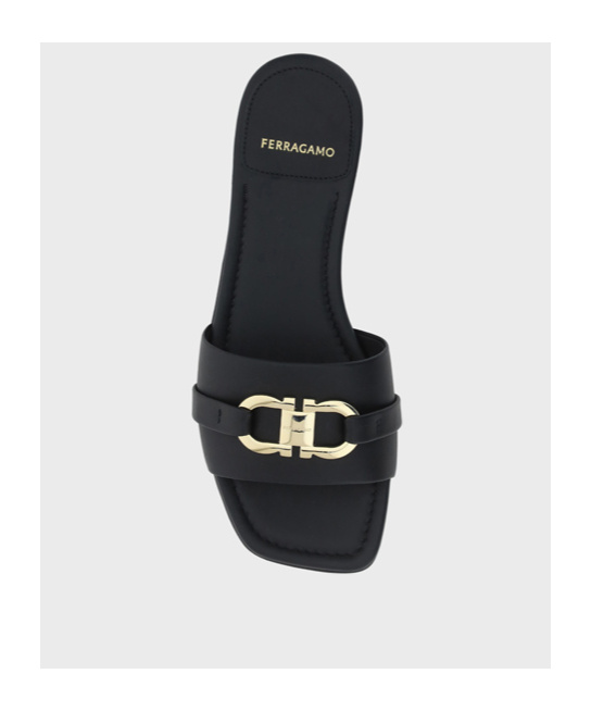 Shop Ferragamo Flat-bottomed Sandals In Black