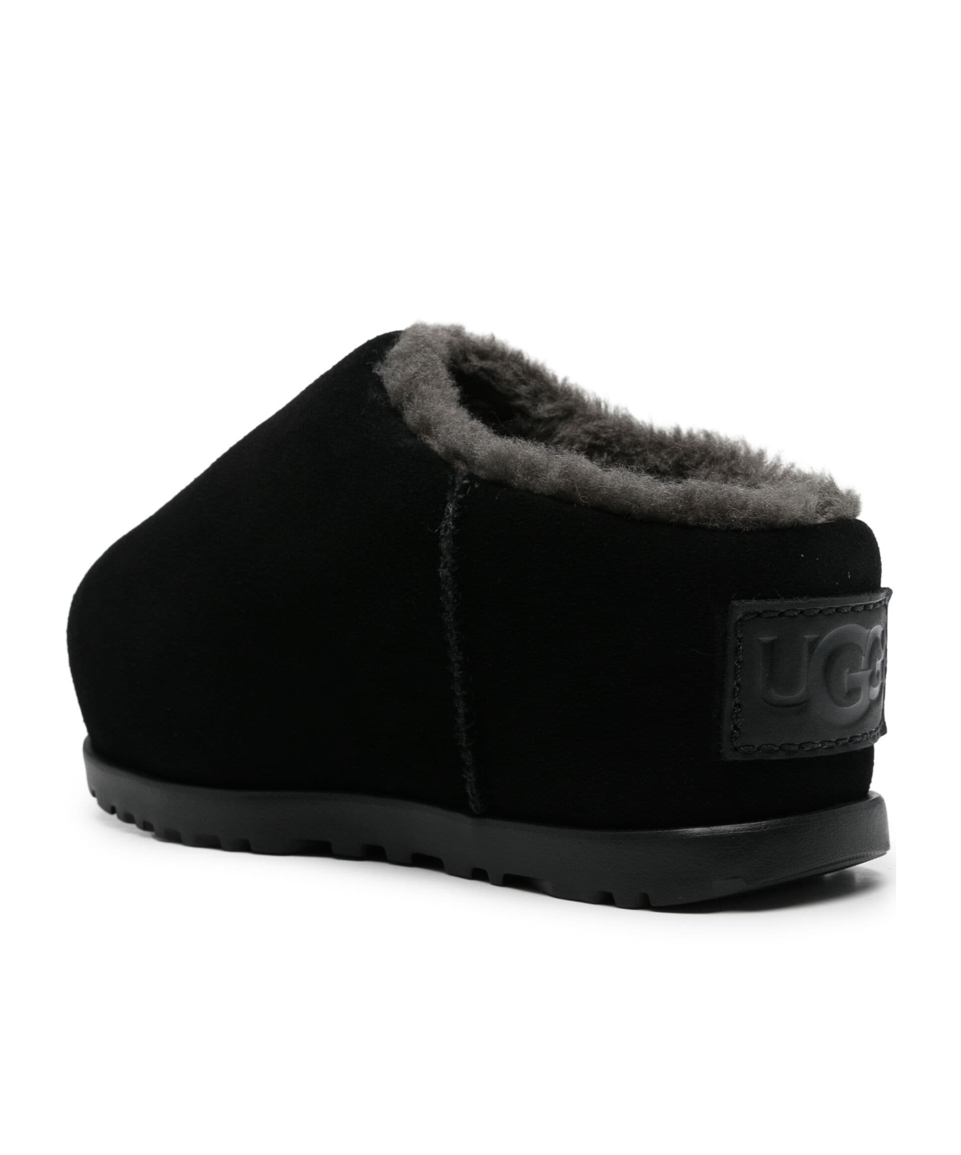 Shop Ugg Pumped Round Toe Slides In Black