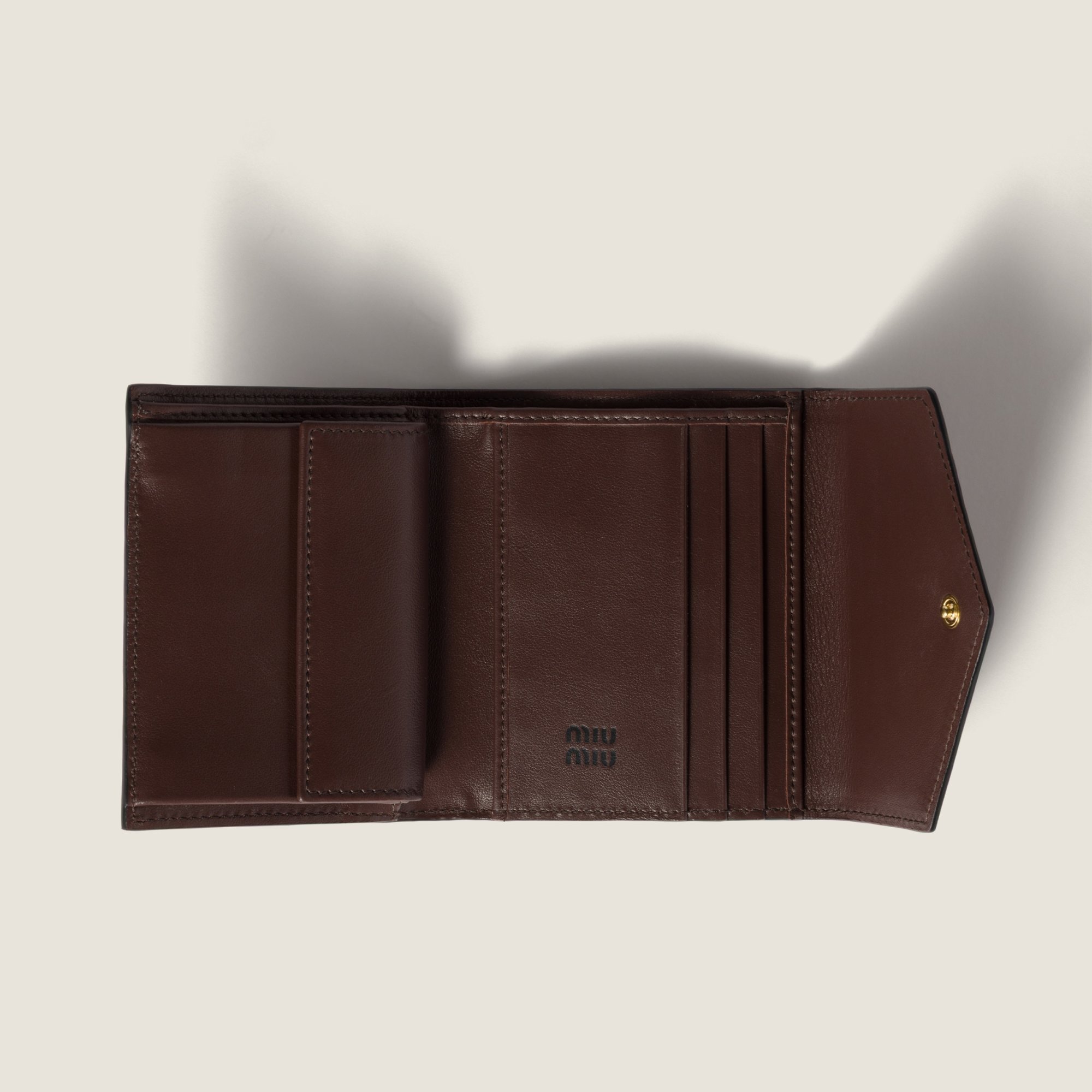 Miu Miu Compact Leather Wallet Fold-over Flap In Brown