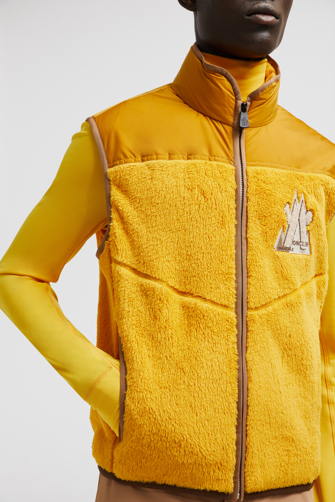 Moncler Logo Embroidered Down Vest In Yellow