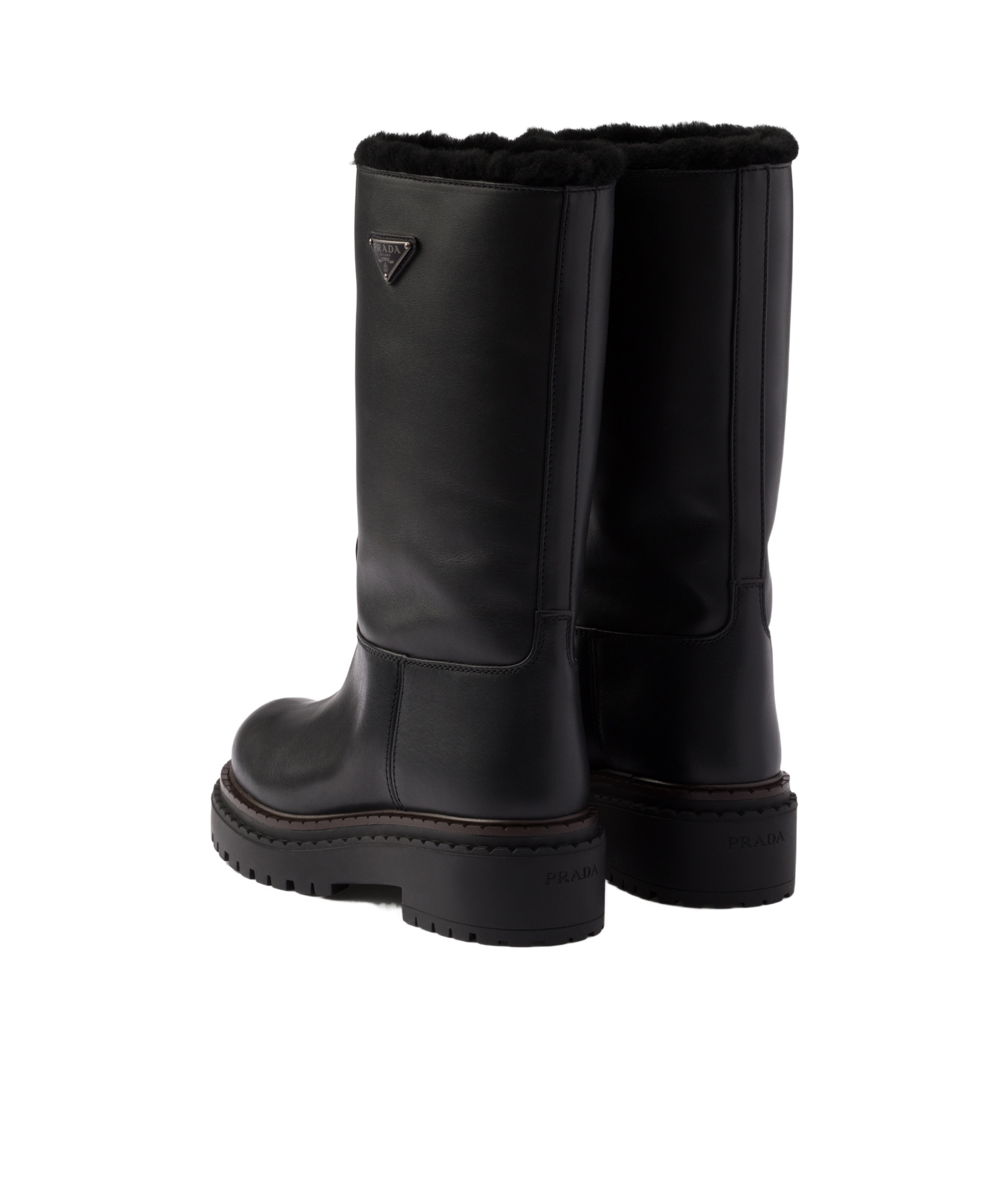 Shop Prada Leather And Shearling Boots In Black