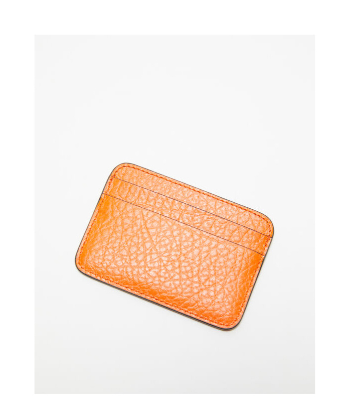 Acne Studios Embossed Logo Clip In Orange