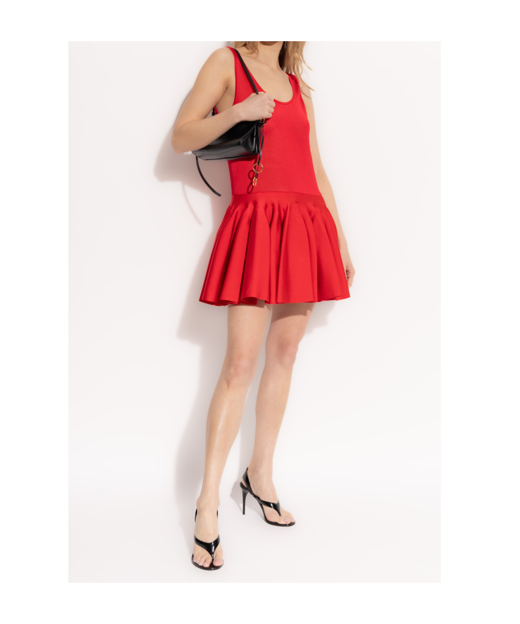 ALAÏA KNITTED GODET MINI DRESS 