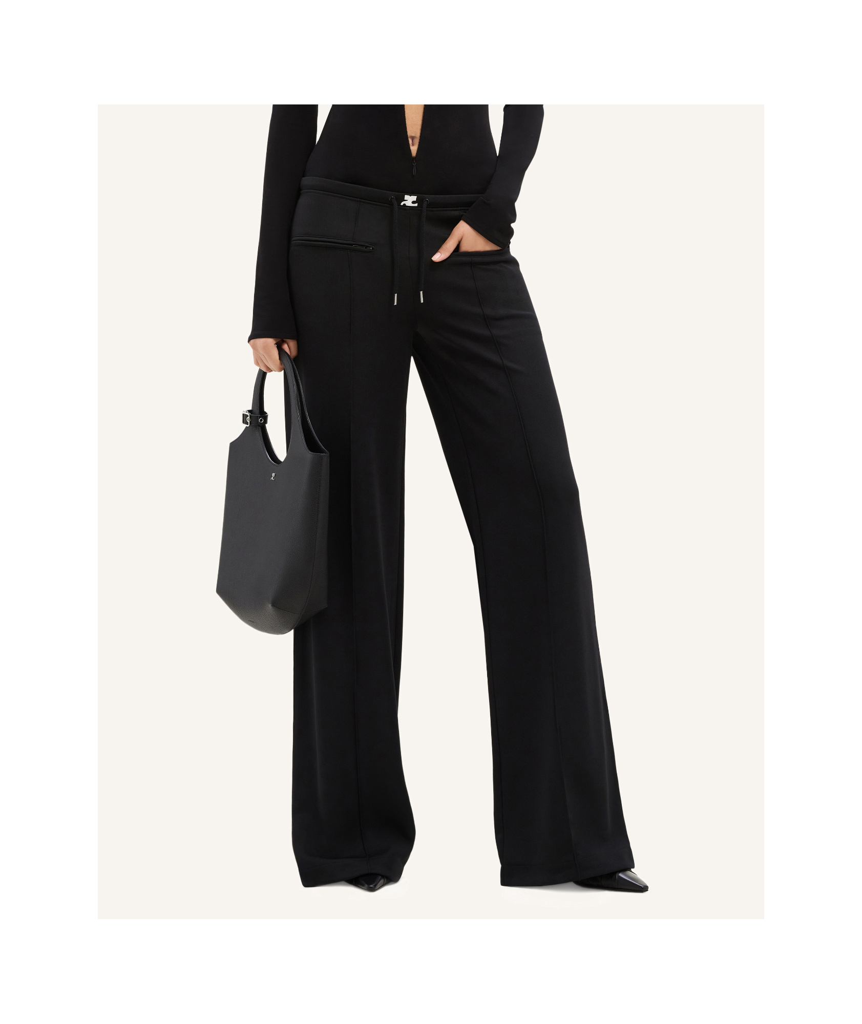 Shop Courrèges Tracksuit Interlock Low-rise Baggy Pants In Black