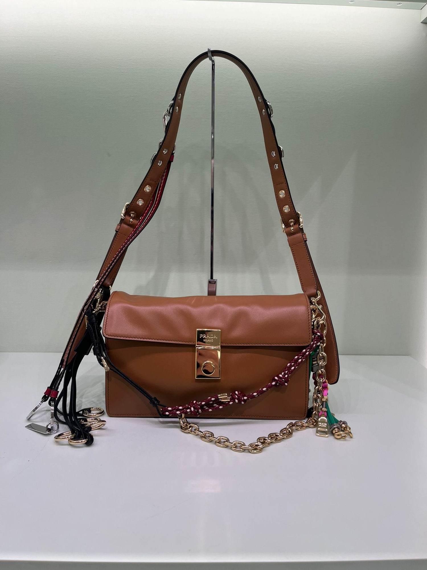 Prada Small Leather Shoulder Bag With Ornaments In Brown