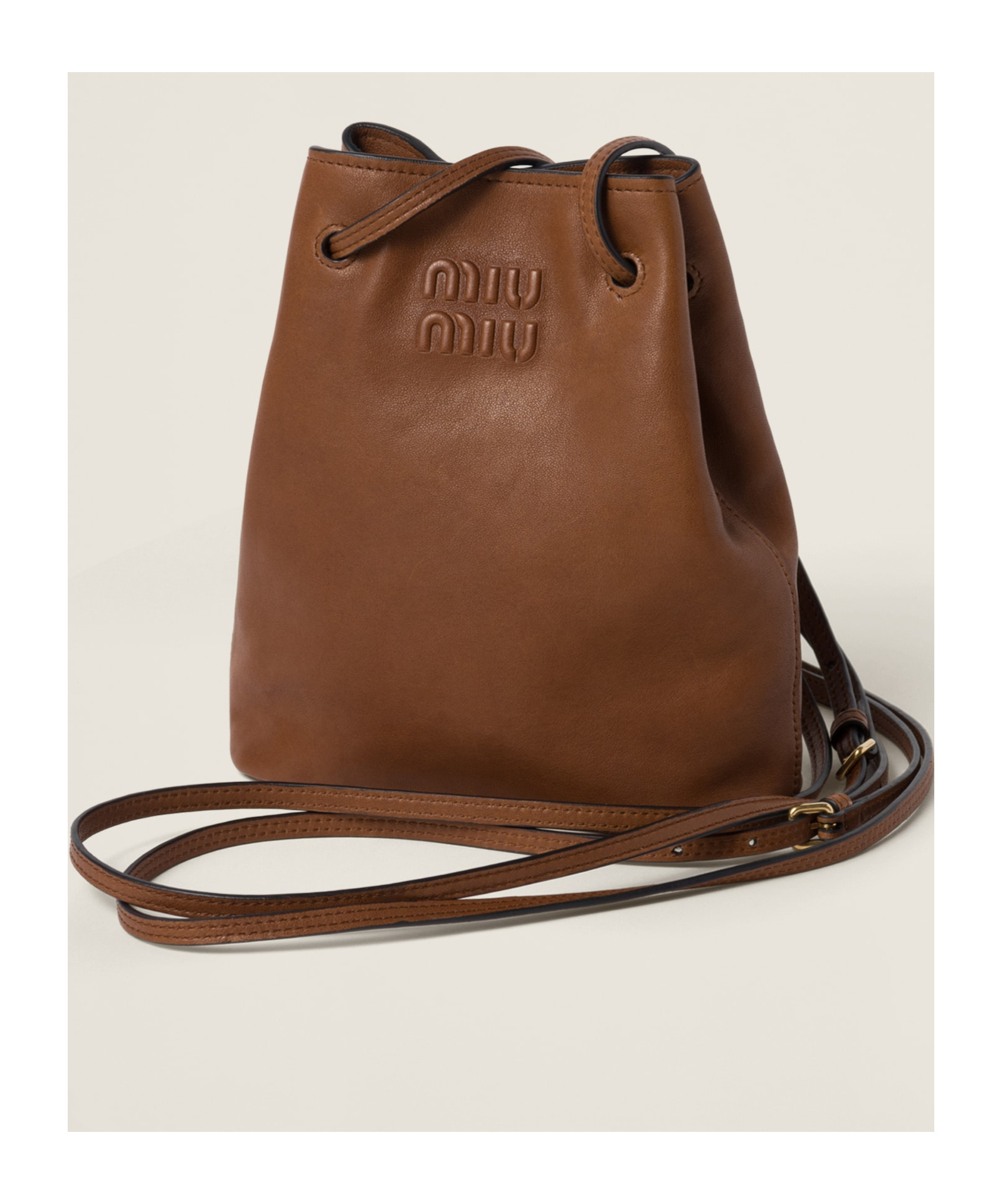 Miu Miu Mini Logo-embossed Bucket Bag In Brown