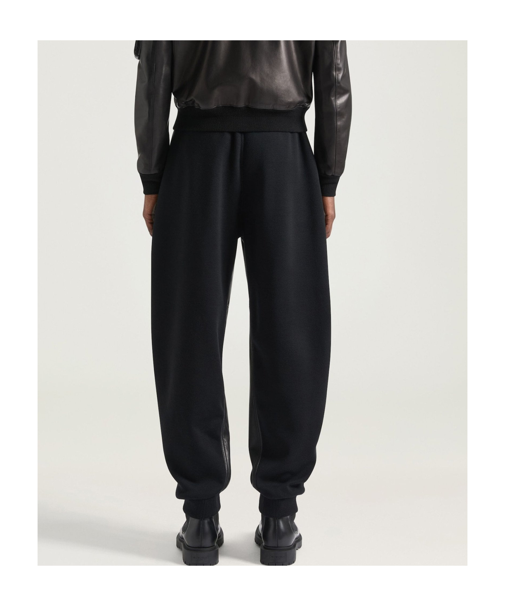Givenchy Jogger Pants In Leather And Wool In Black