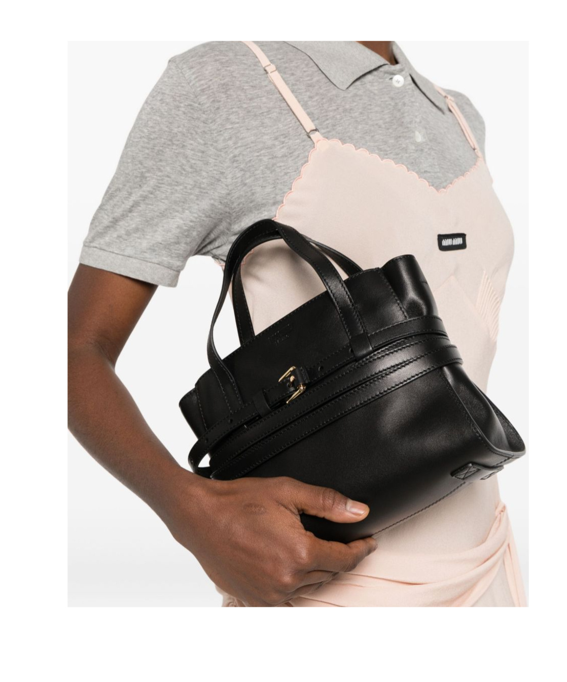 Moschino Logo Embossed Tie Me Handbag In Black