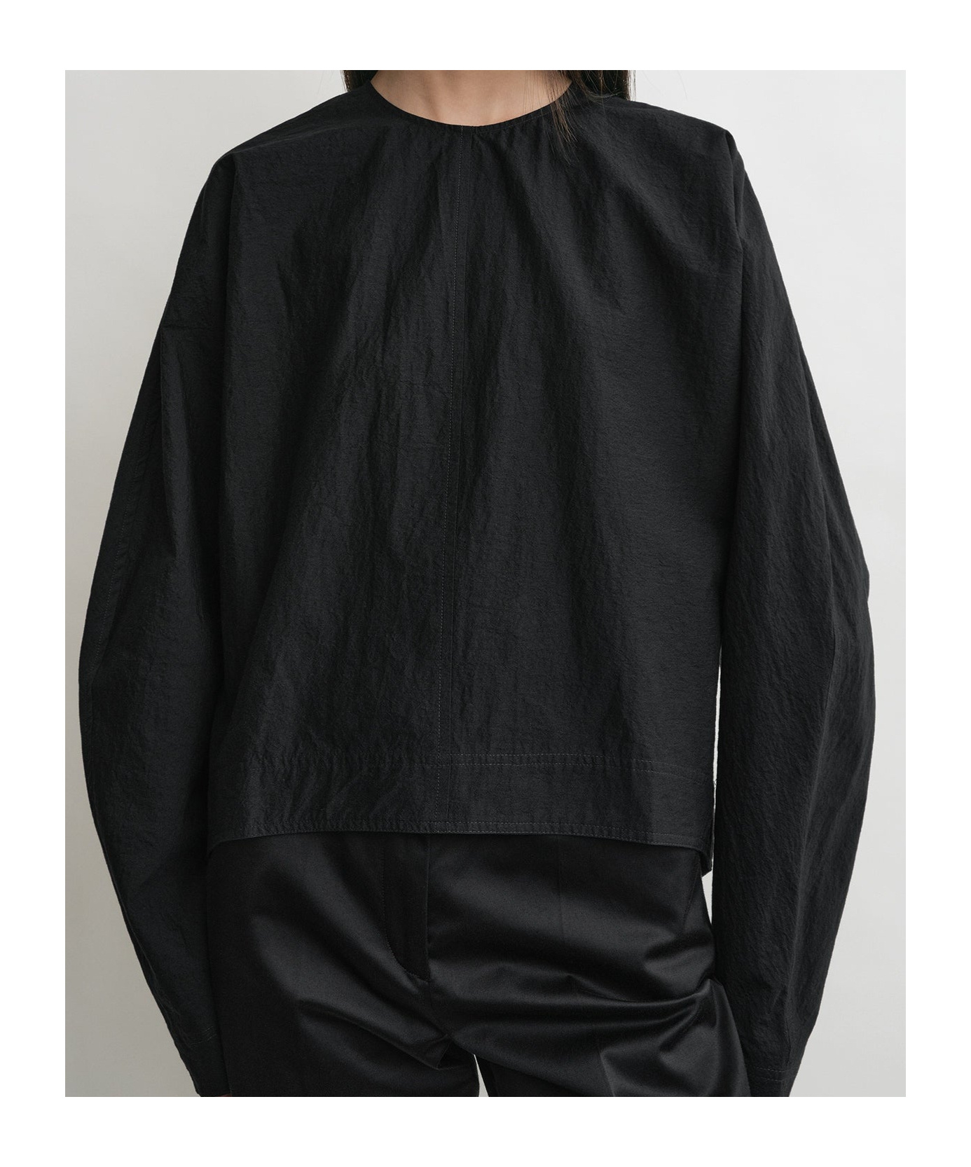 Totême Round-collar And Long-sleeved Top In Black