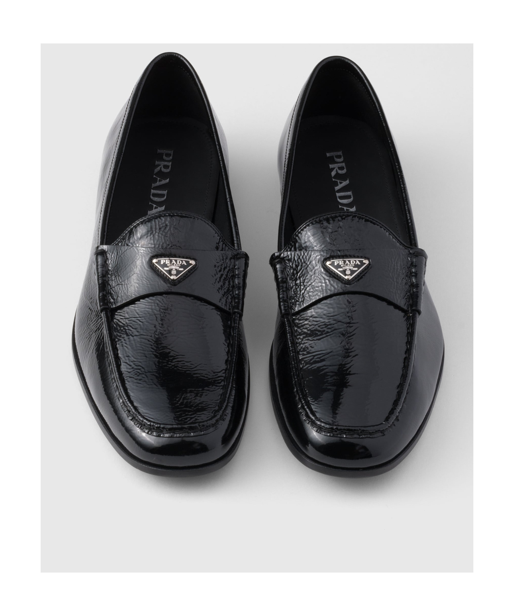 Prada Naplak Leather Loafers In Black