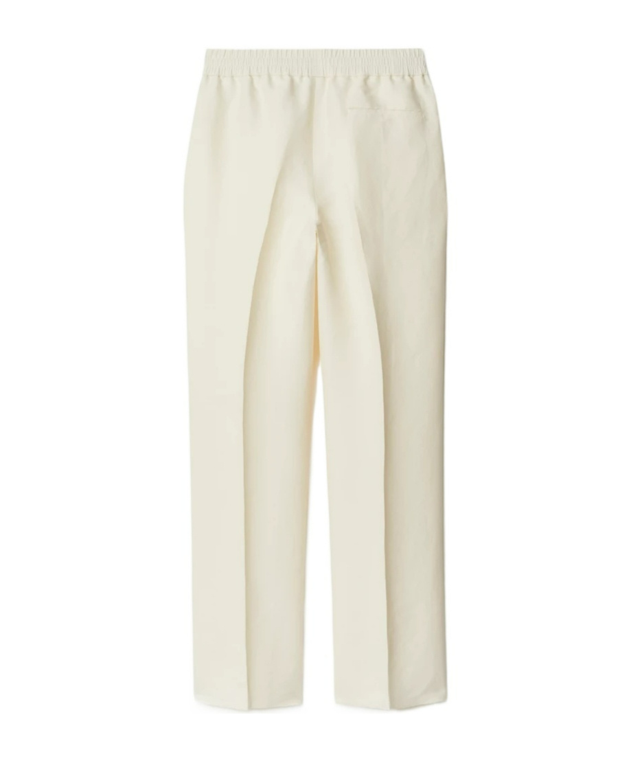 Shop Burberry Tapered-leg Canvas Trousers In White