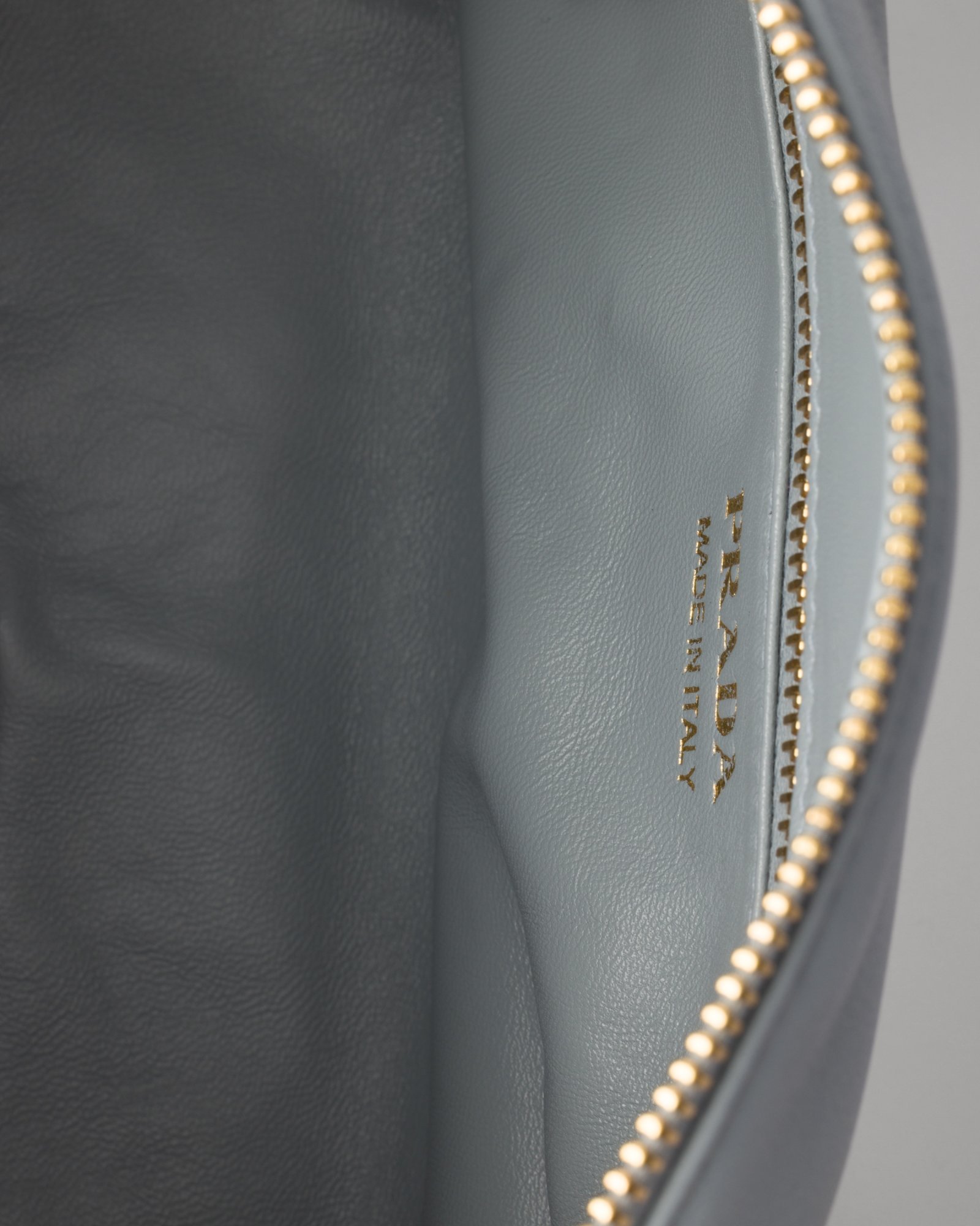 Shop Prada Medium Leather Top-handle Bag With Padlock In Gray