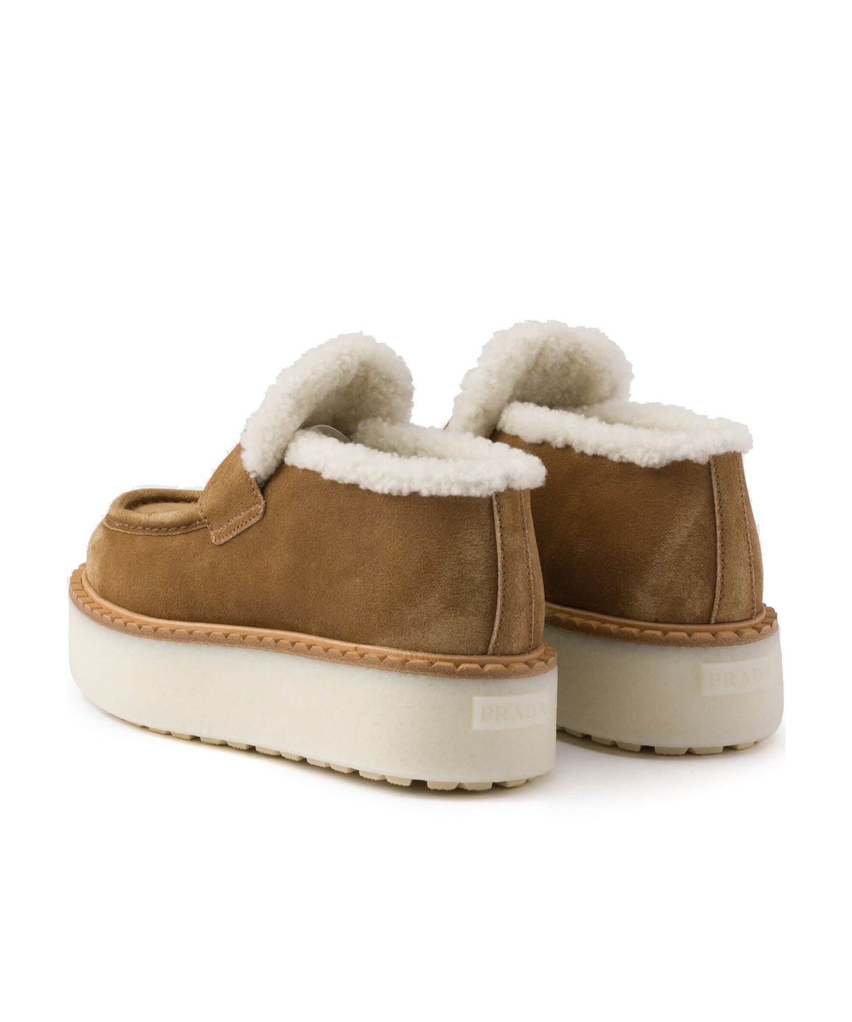 Prada Suede Shearling Flatform Loafers In Brown