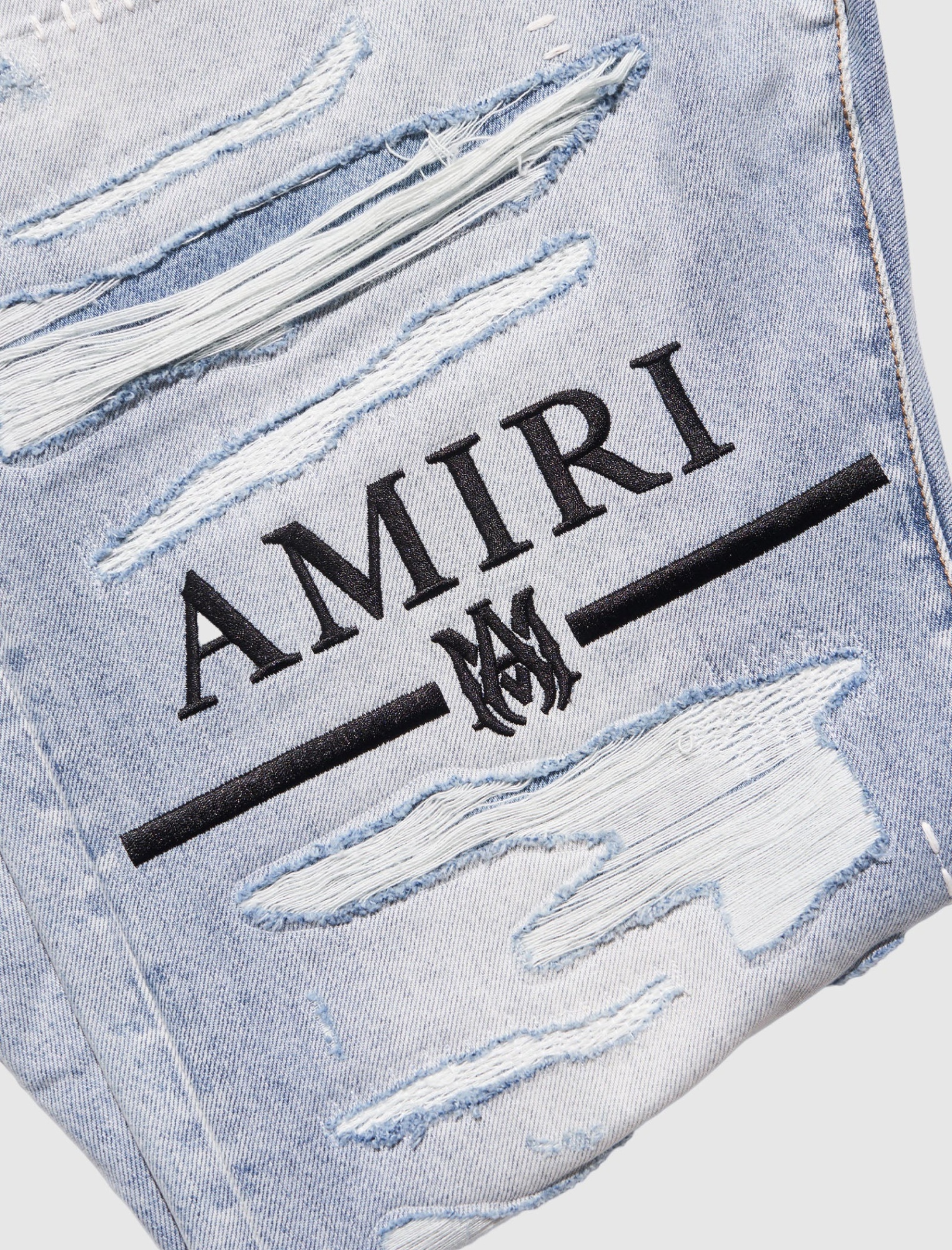 Amiri Logo-embroidery Ripped Jeans In Gray