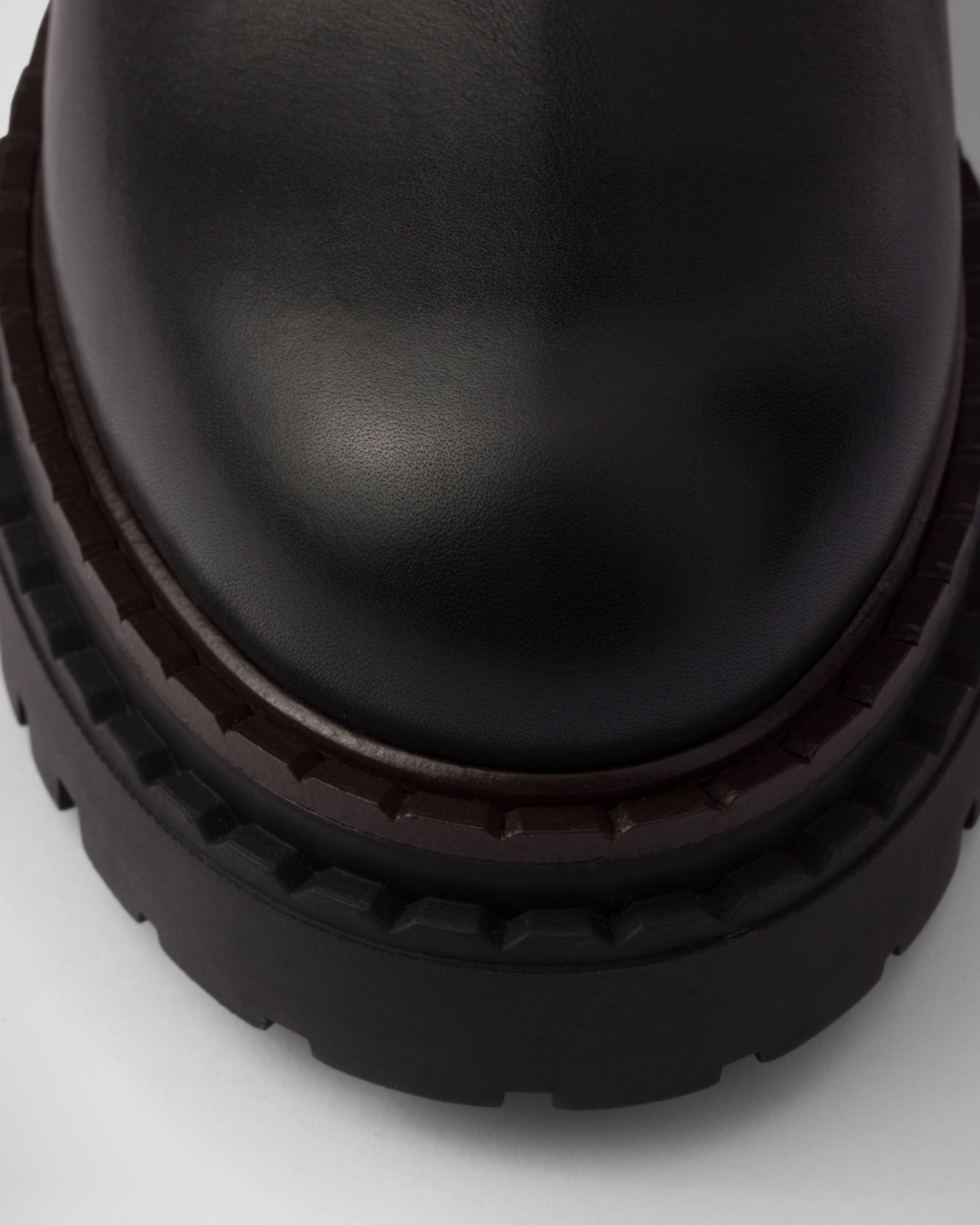 Shop Prada Leather And Shearling Boots In Black