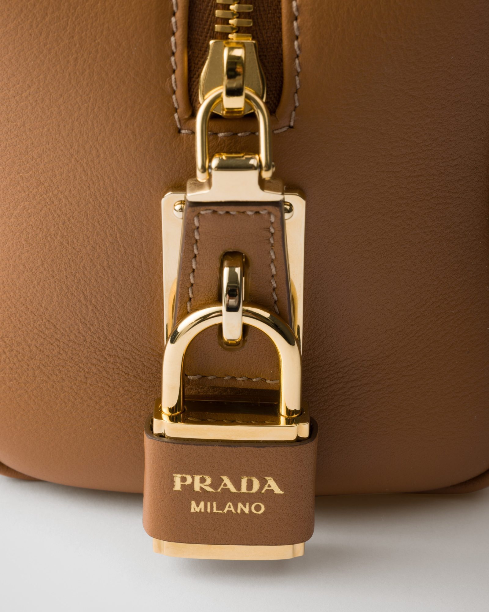 Prada Re-nylon And Leather Medium Top-handle Bag With Padlock In Brown