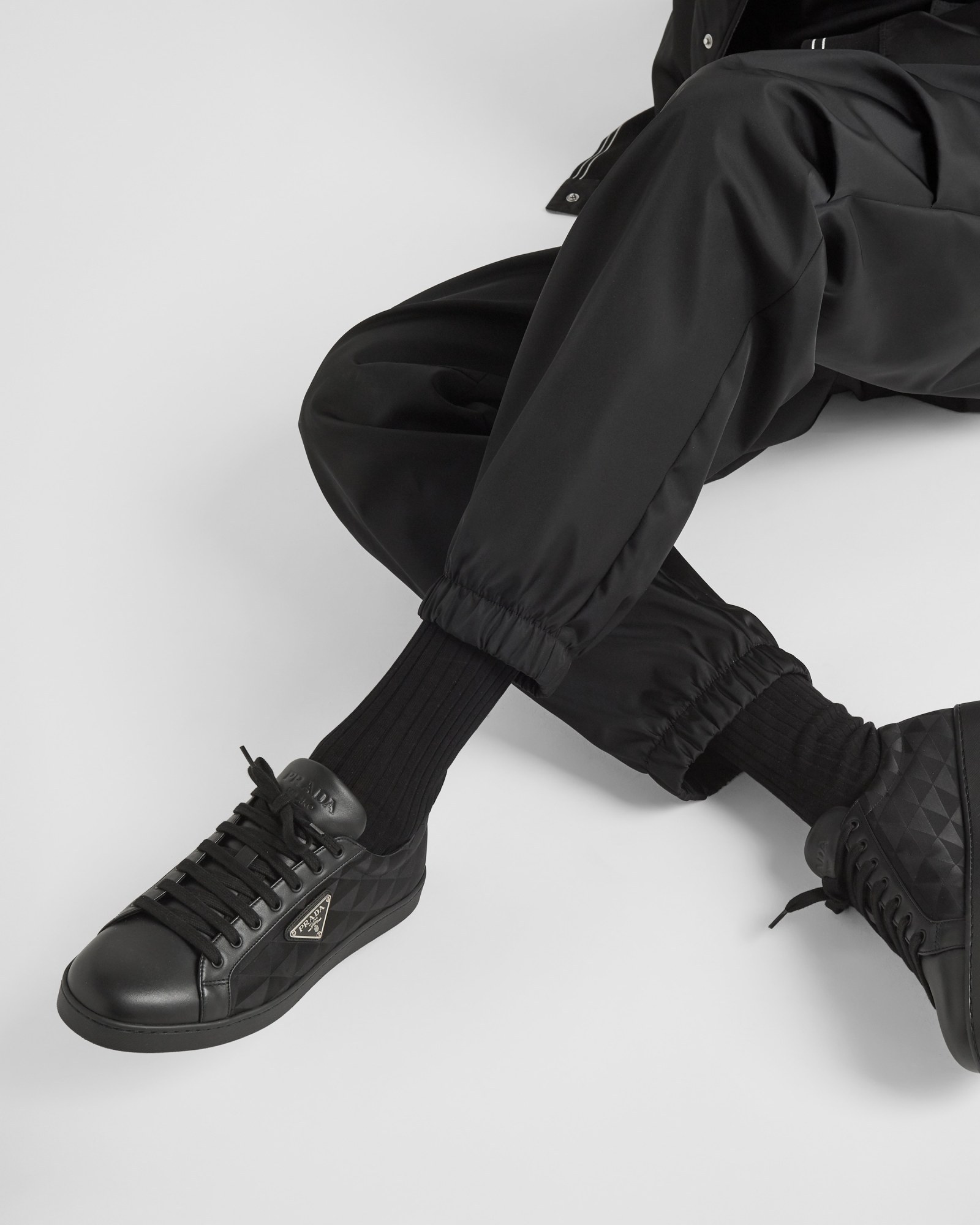 Shop Prada Leather And Nylon Sneakers In Black