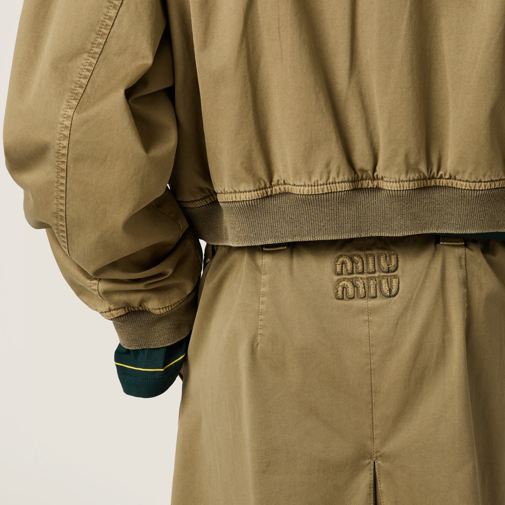 Miu Miu Logo Embroidered Mini Skirt In Green