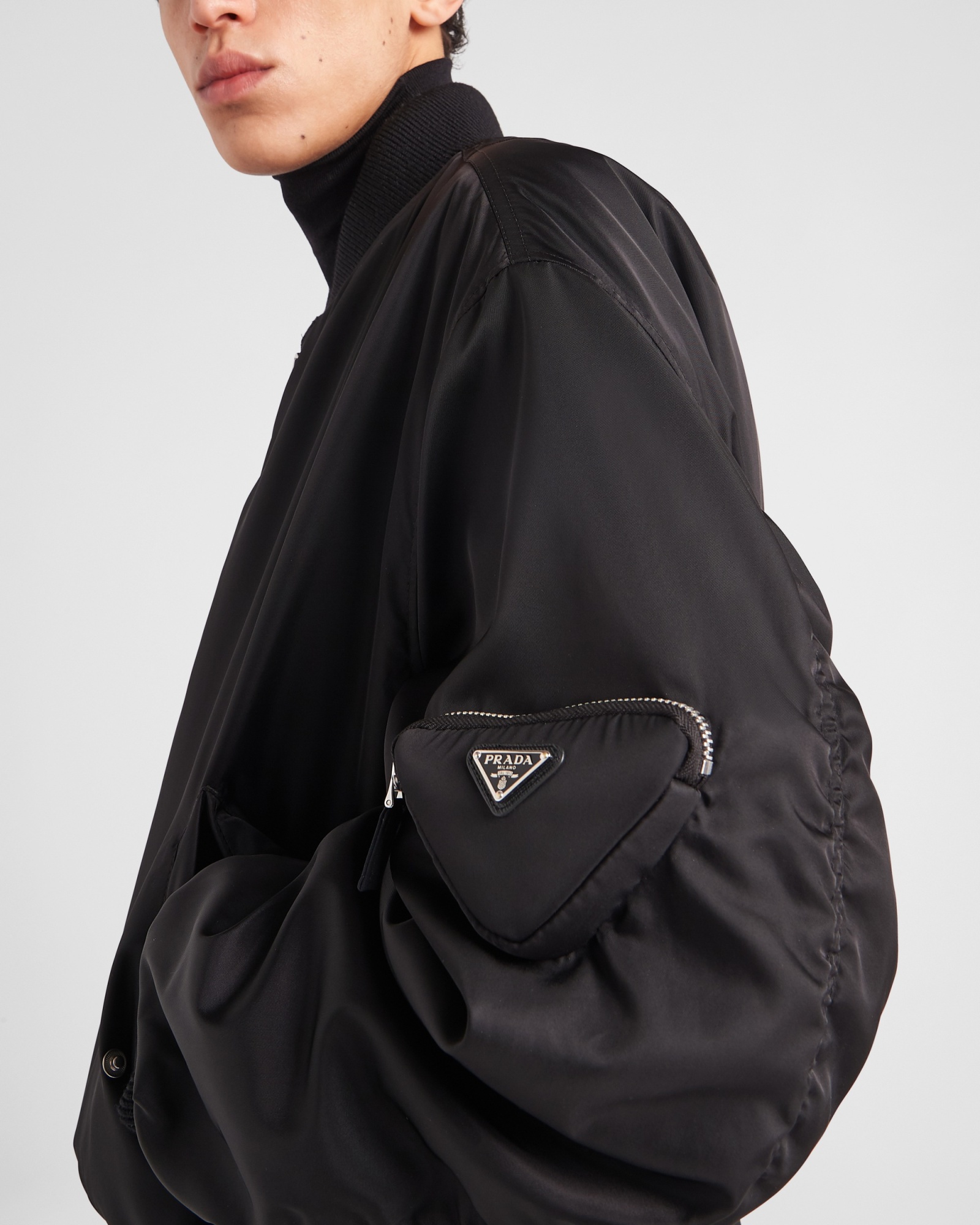 Prada Logo Plaque Bomber Jacket In Black