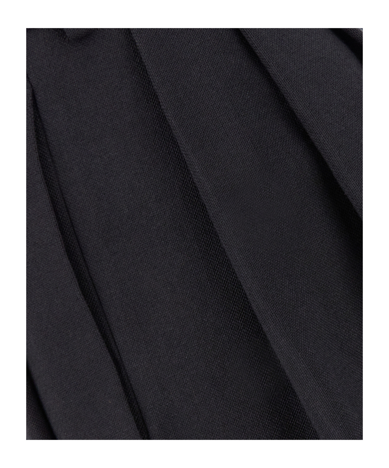 Quira Wool Pant With Tapered Leg And Pleated Design In Black