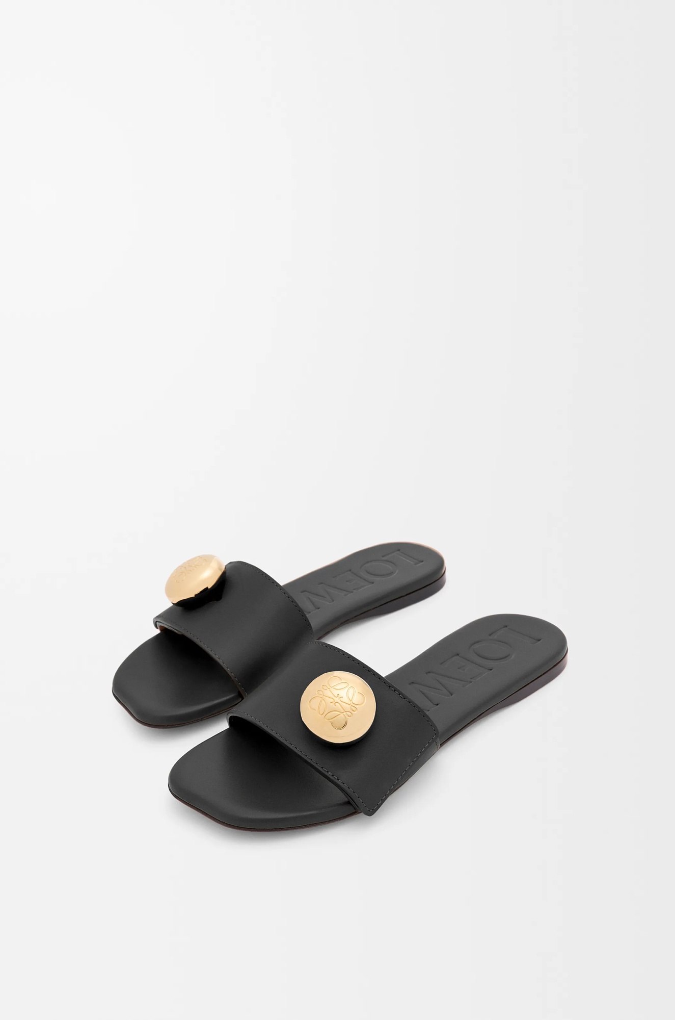 Loewe Elegant Black Calf Leather Sandals With Gold Embellishment In Black