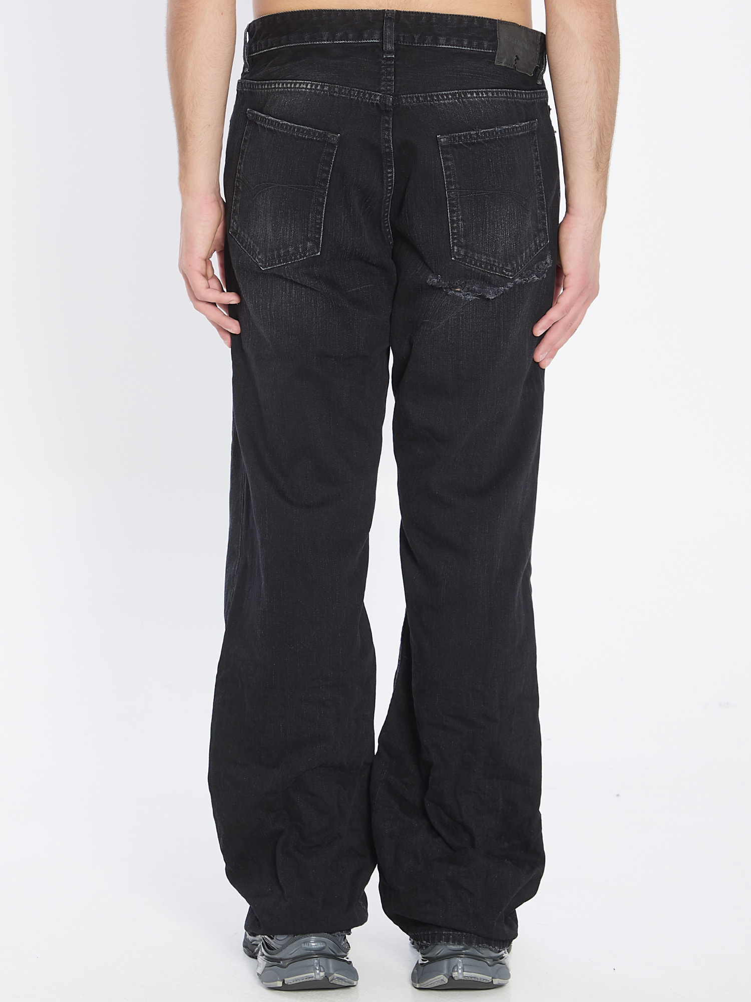 Balenciaga Relaxed Fit Distressed Denim Trousers In Black