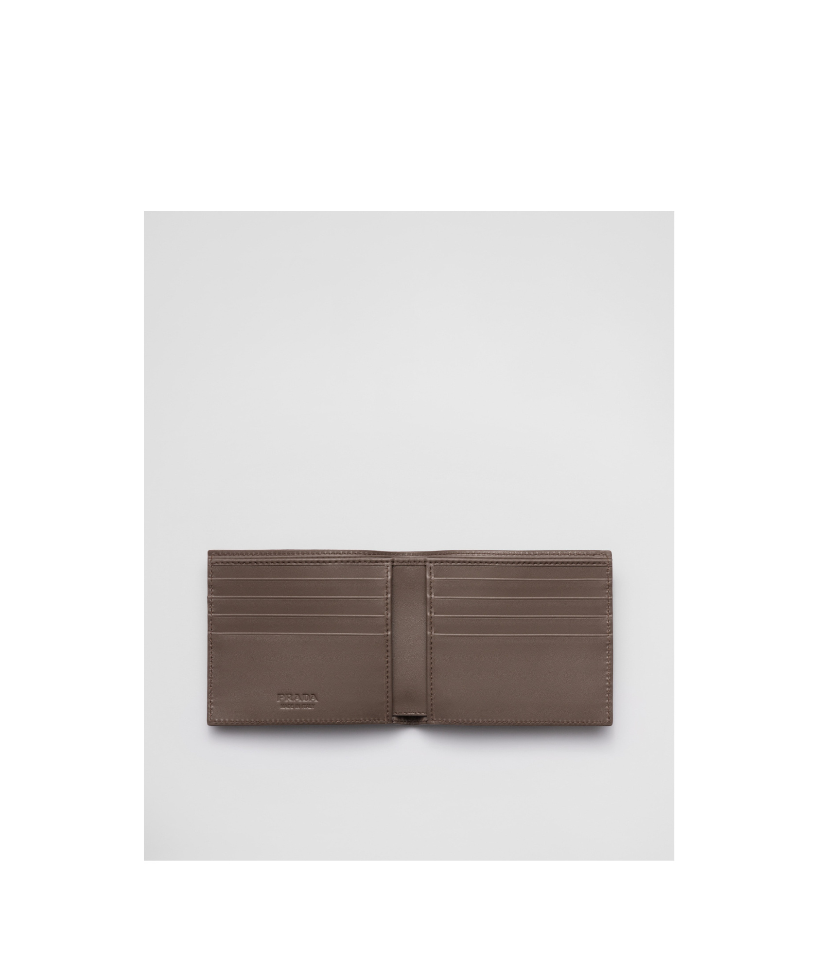 Prada Grained Leather Triangle Wallet In Brown