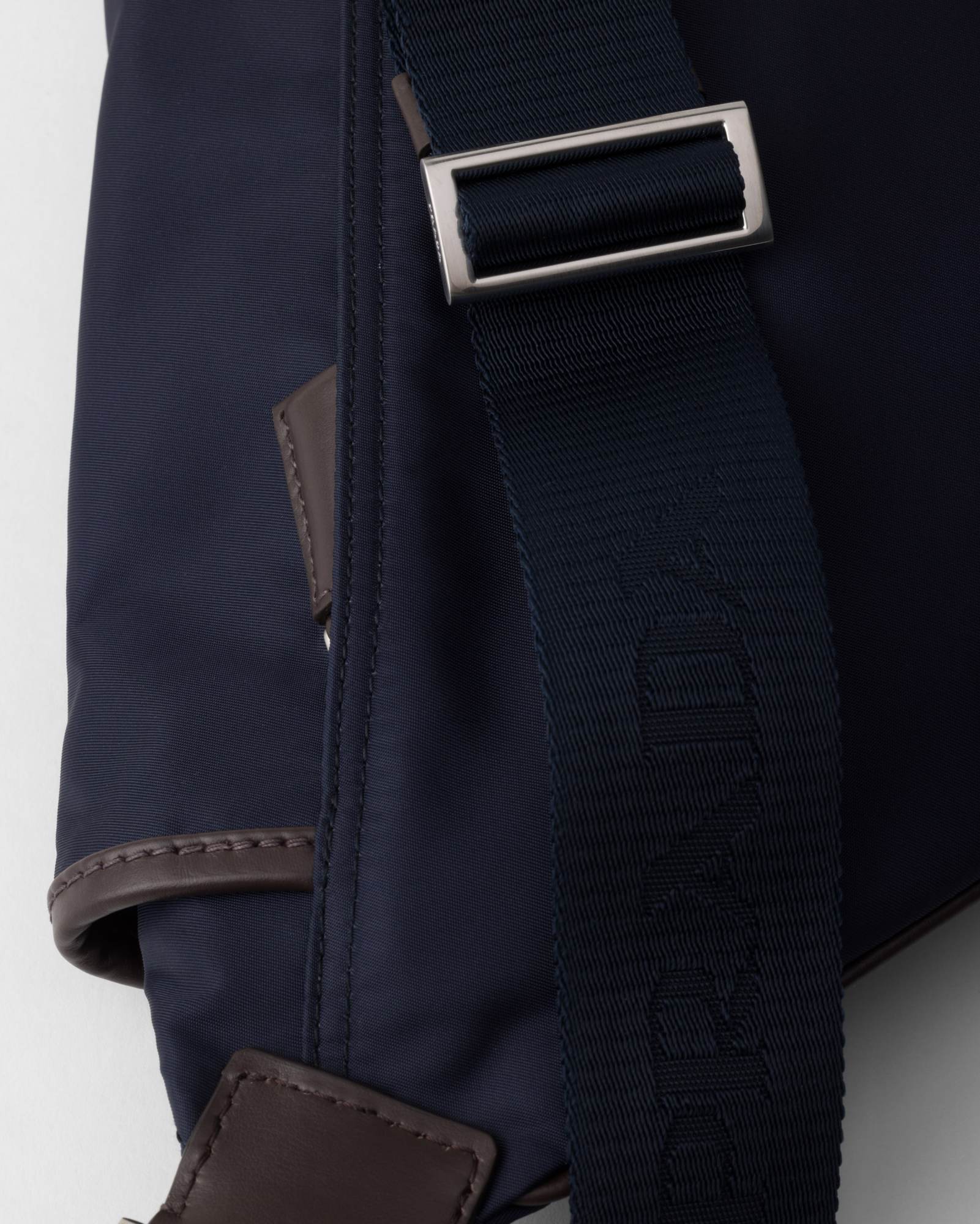 Prada Triangle-enamel Belt Bag In Blue/coffee