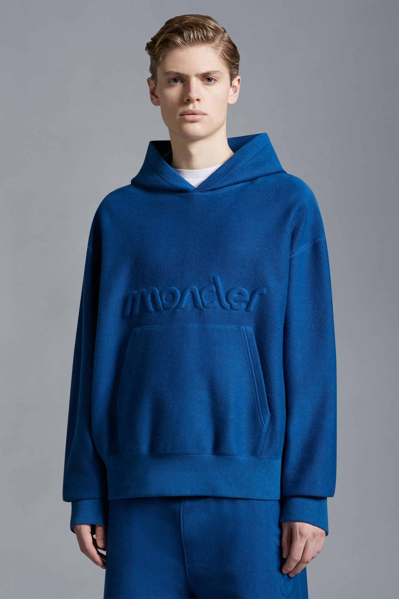 Moncler Logo Embossed Hoodie In Blue