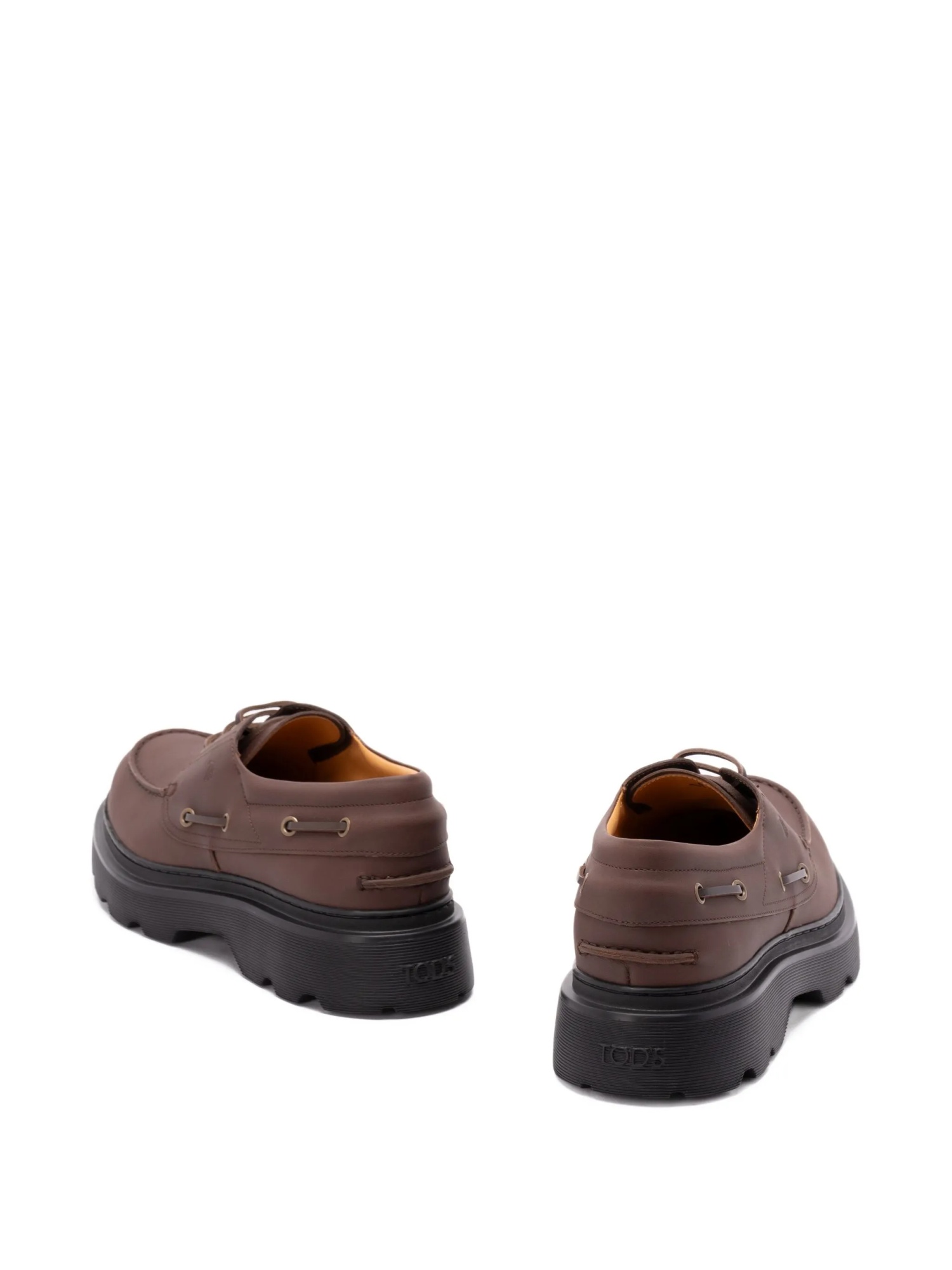 Tod's Boat Shoes With Chunky Sole And Eyelet Detailing In Brown