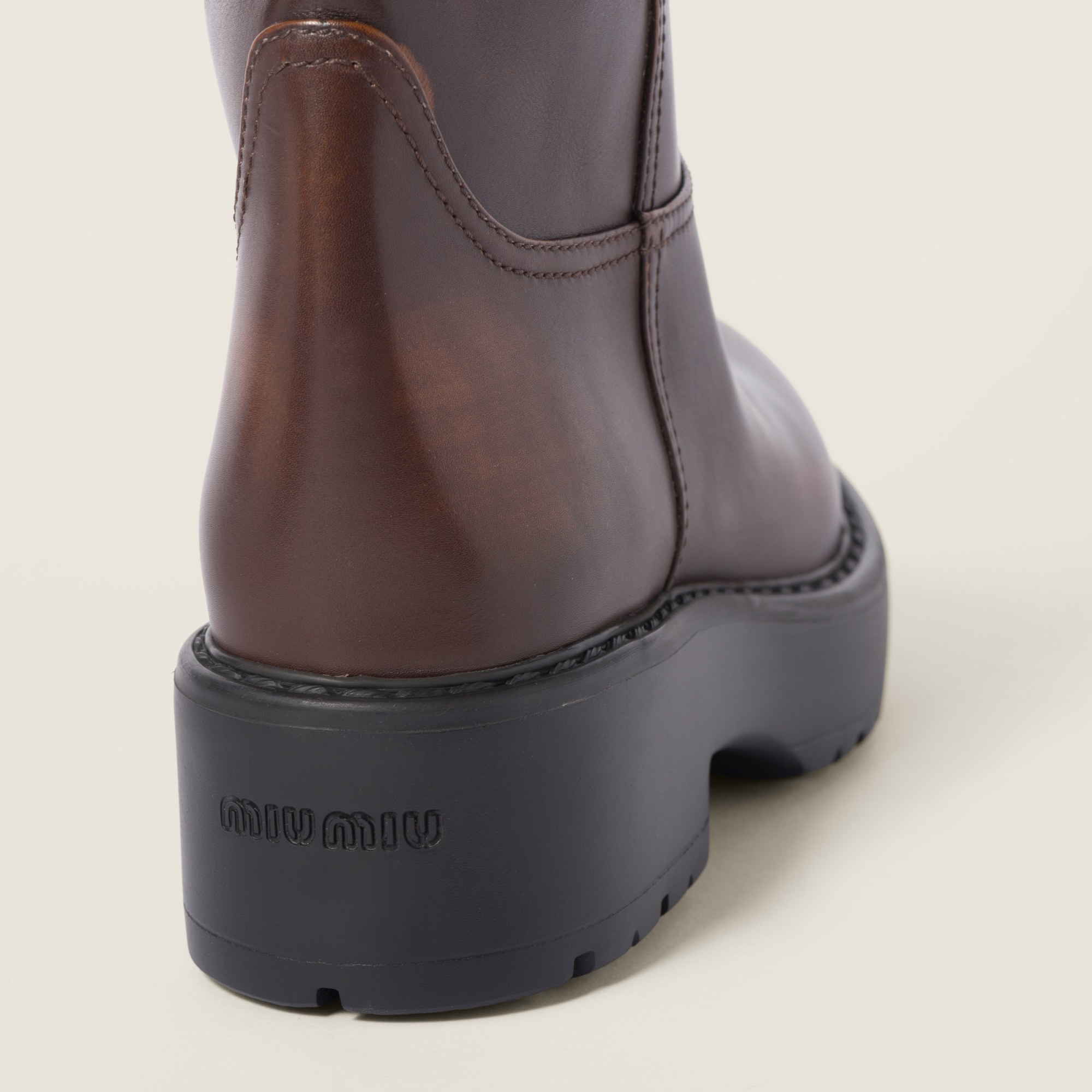 Miu Miu Logo Short Boots In Black