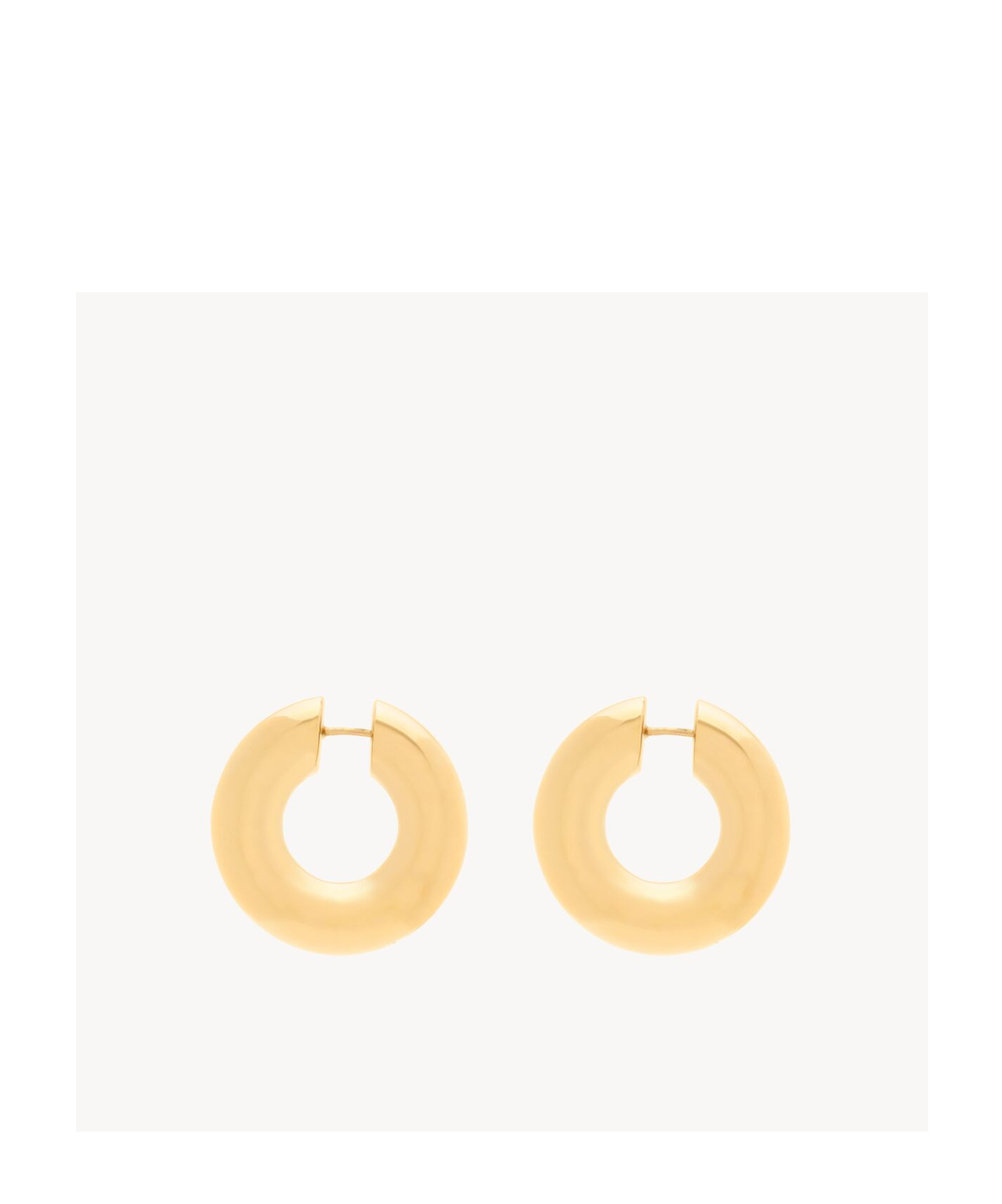 Saint Laurent Tube Hoop Earrings In Metal In Gold
