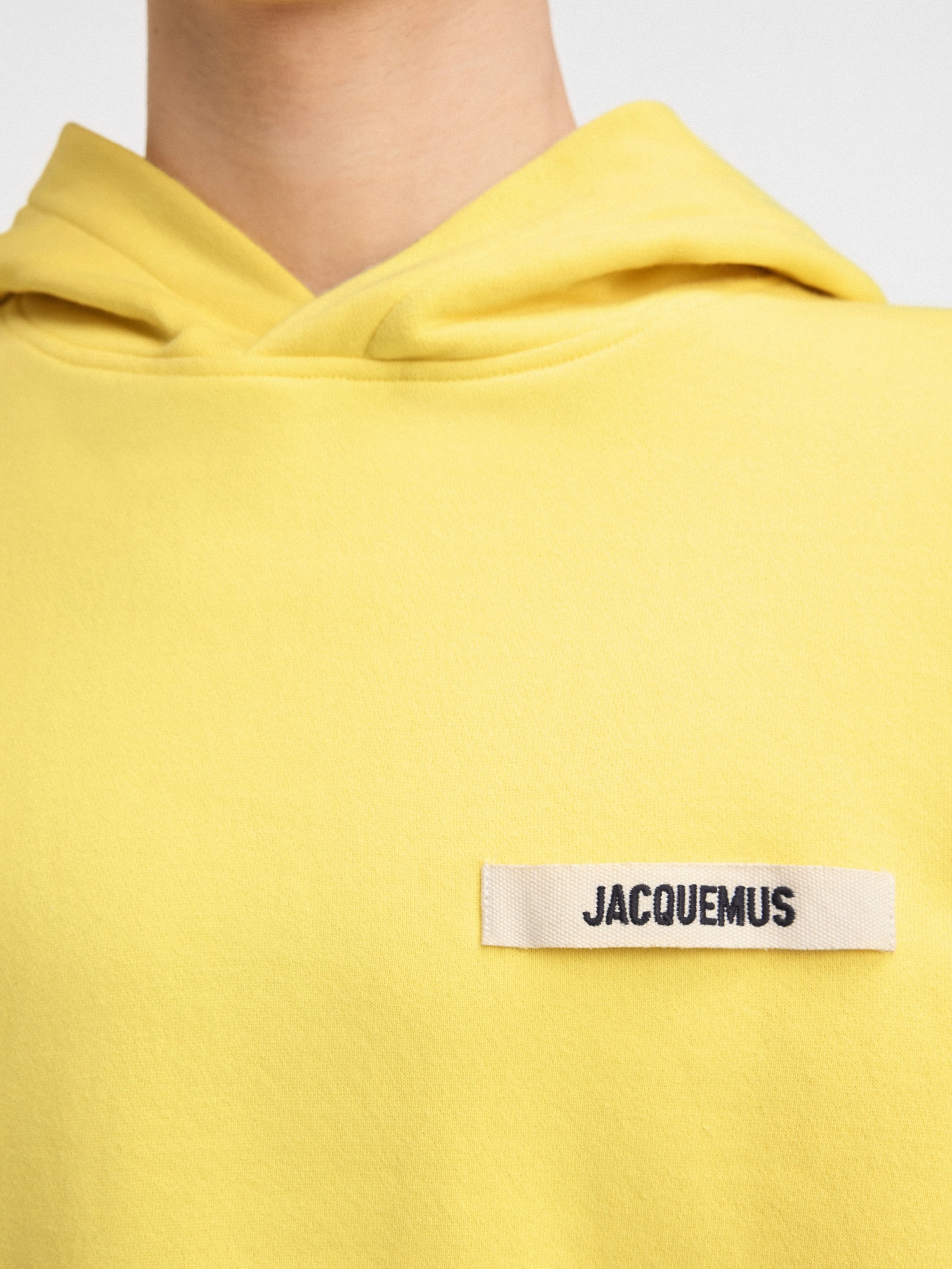 Jacquemus Typo Drawstring Hoodie In Yellow