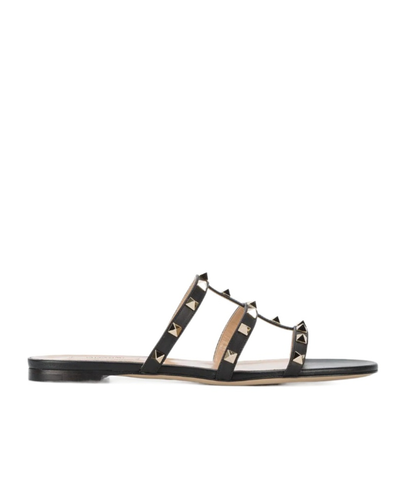 Shop Valentino Rockstud Flat Slide Sandal In Black