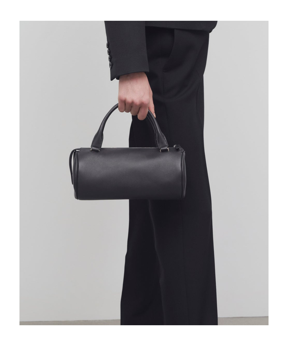 The Row Zip-up Top Handle Bag In Black