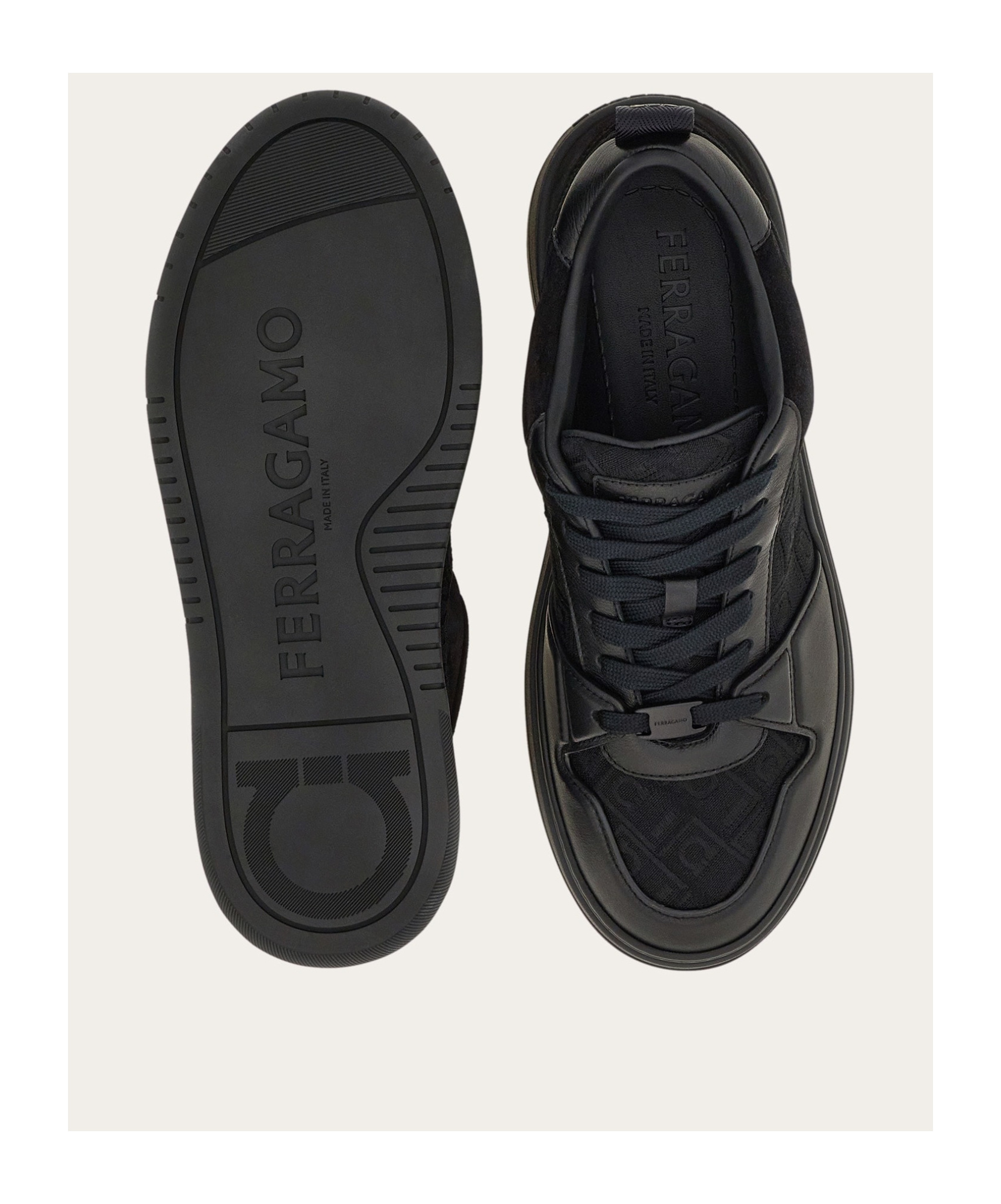 Shop Ferragamo Panelled Leather Sneakers In Black