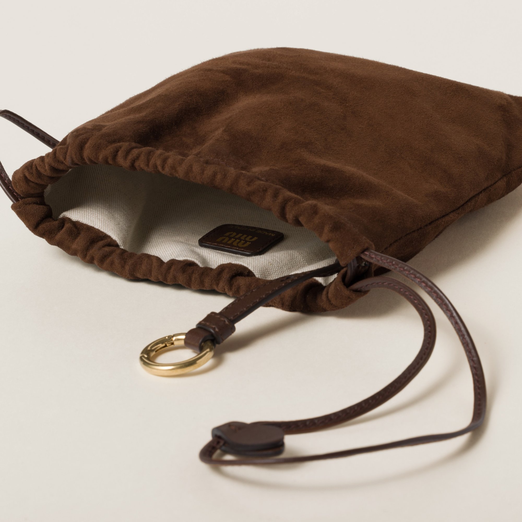 Miu Miu Logo Clutch In Brown