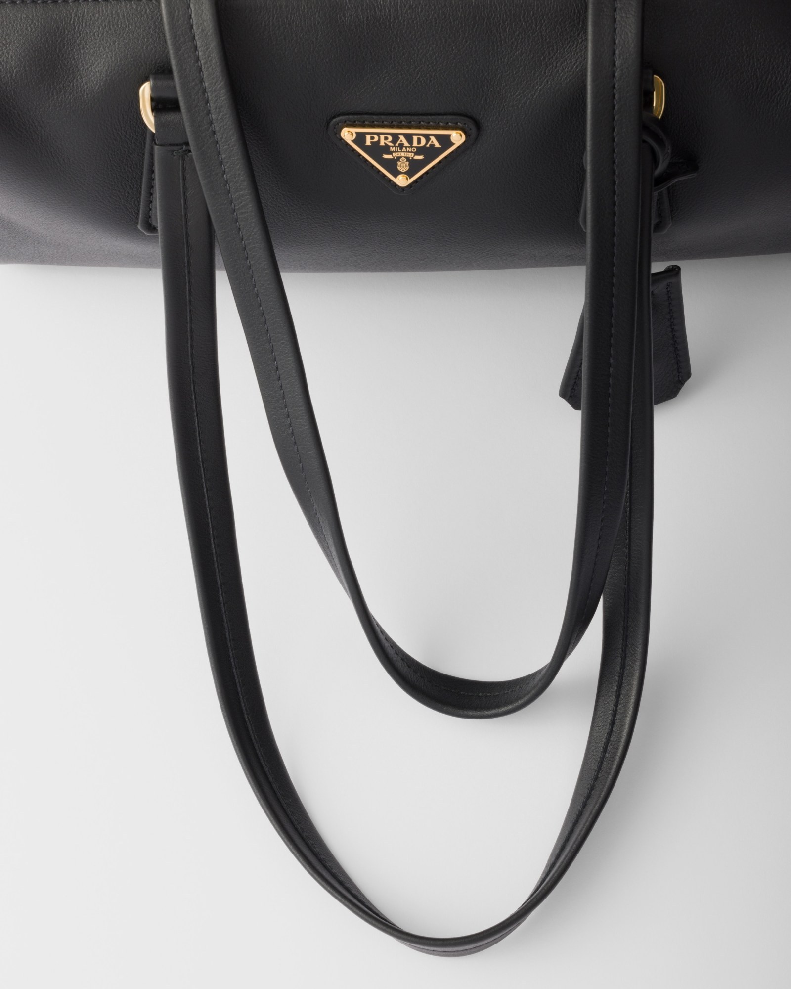 Prada Women Re-nylon And Leather Medium Top-handle Bag With Padlock In Black