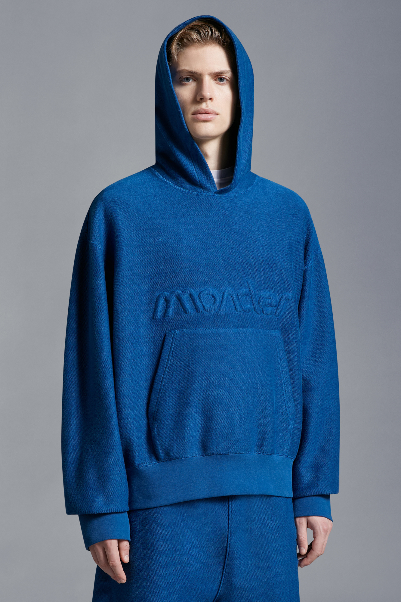 Moncler Logo Embossed Hoodie In Blue