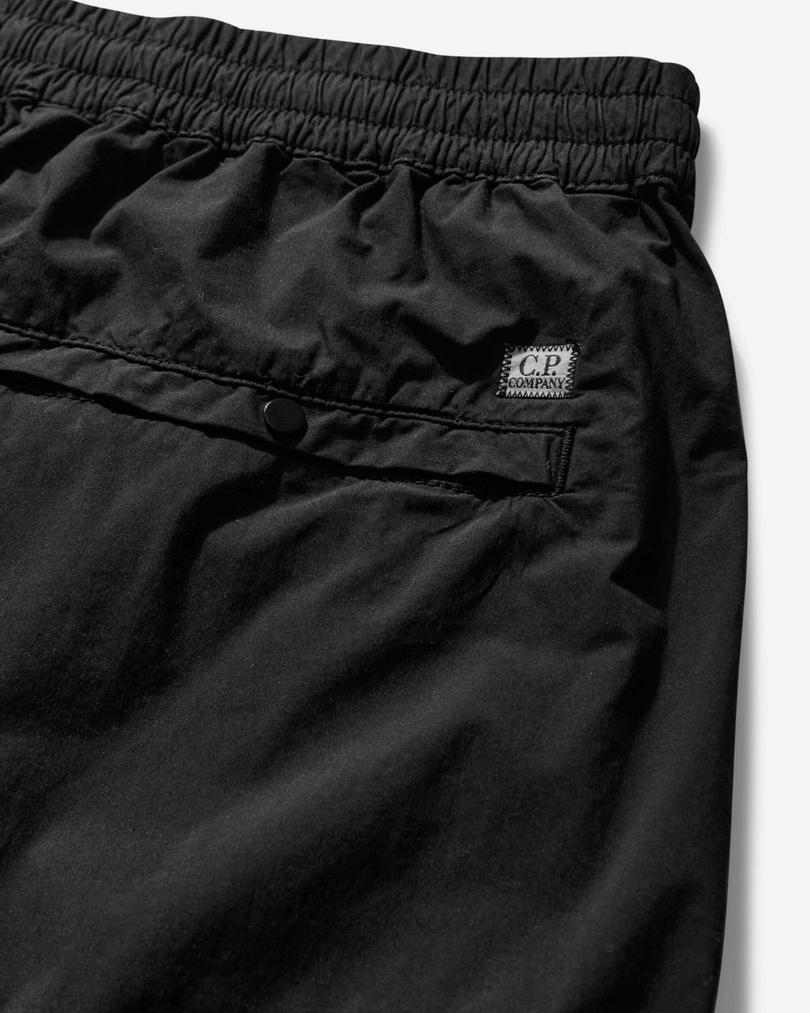 C.p. Company Slim-leg Stretch-cotton Cargo Trousers In Black