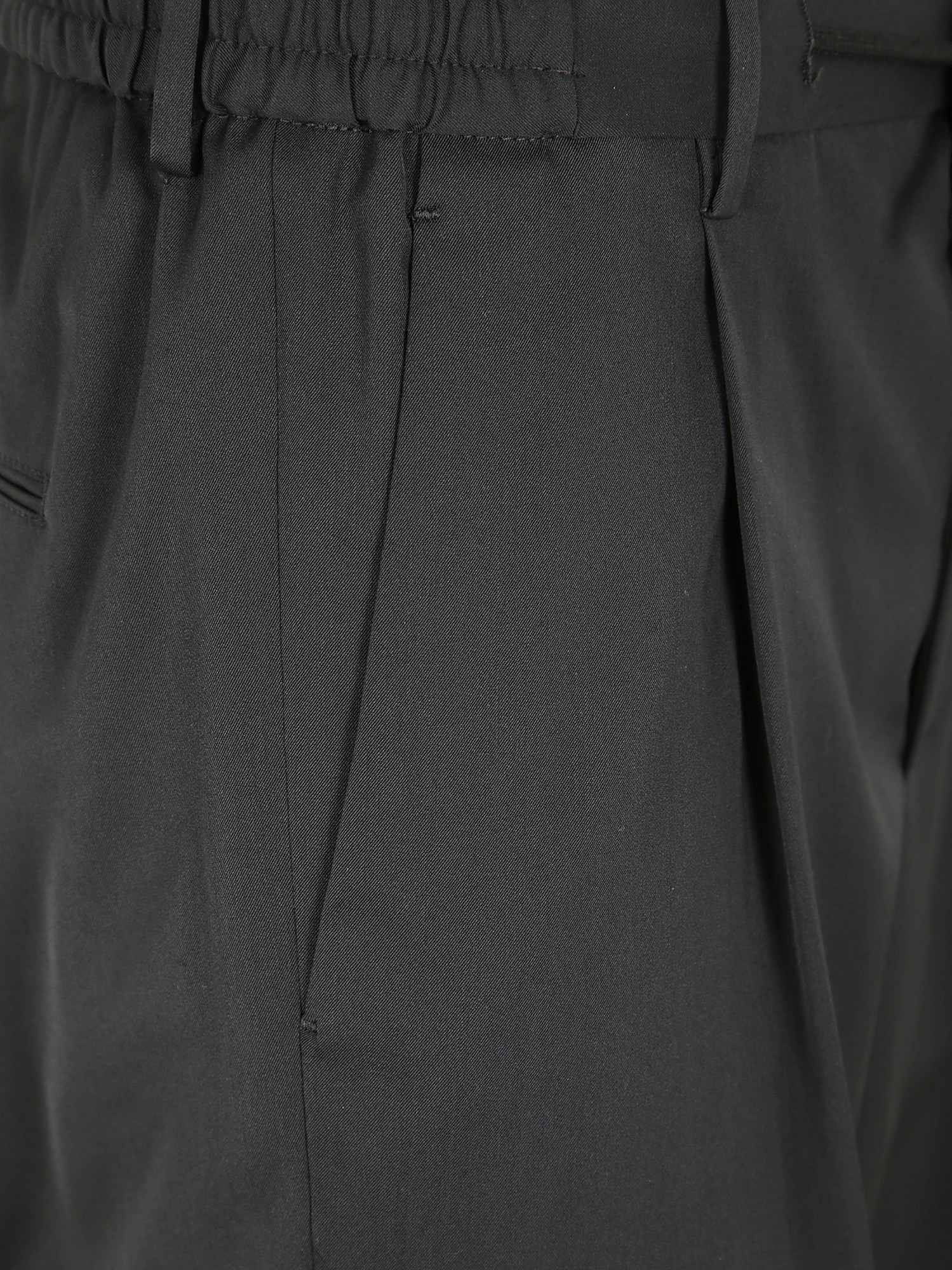 Shop Tagliatore Pleat-detailing Trousers In Black