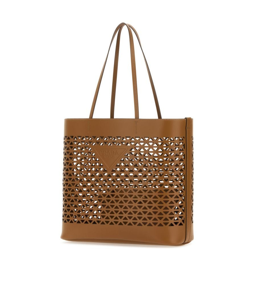 Prada Leather Shopping Bag Featuring Cut-out Detailing In Brown