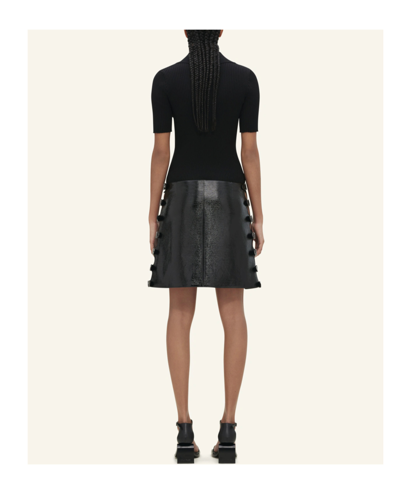 Shop Courrèges Logo-patch Knitted Polo Top In Black