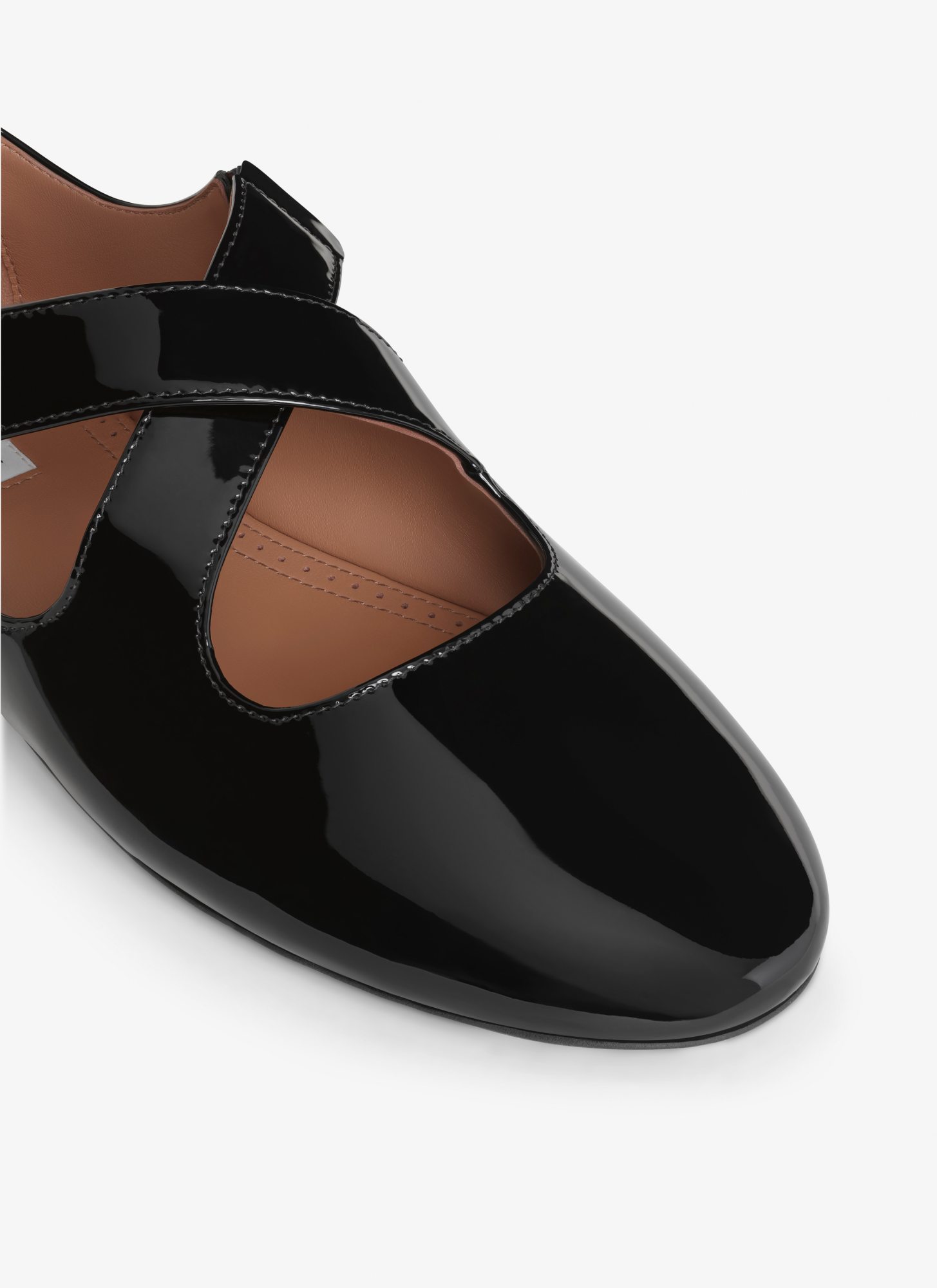 Alaïa Cross-belt Ballet Flat Shoes In Black